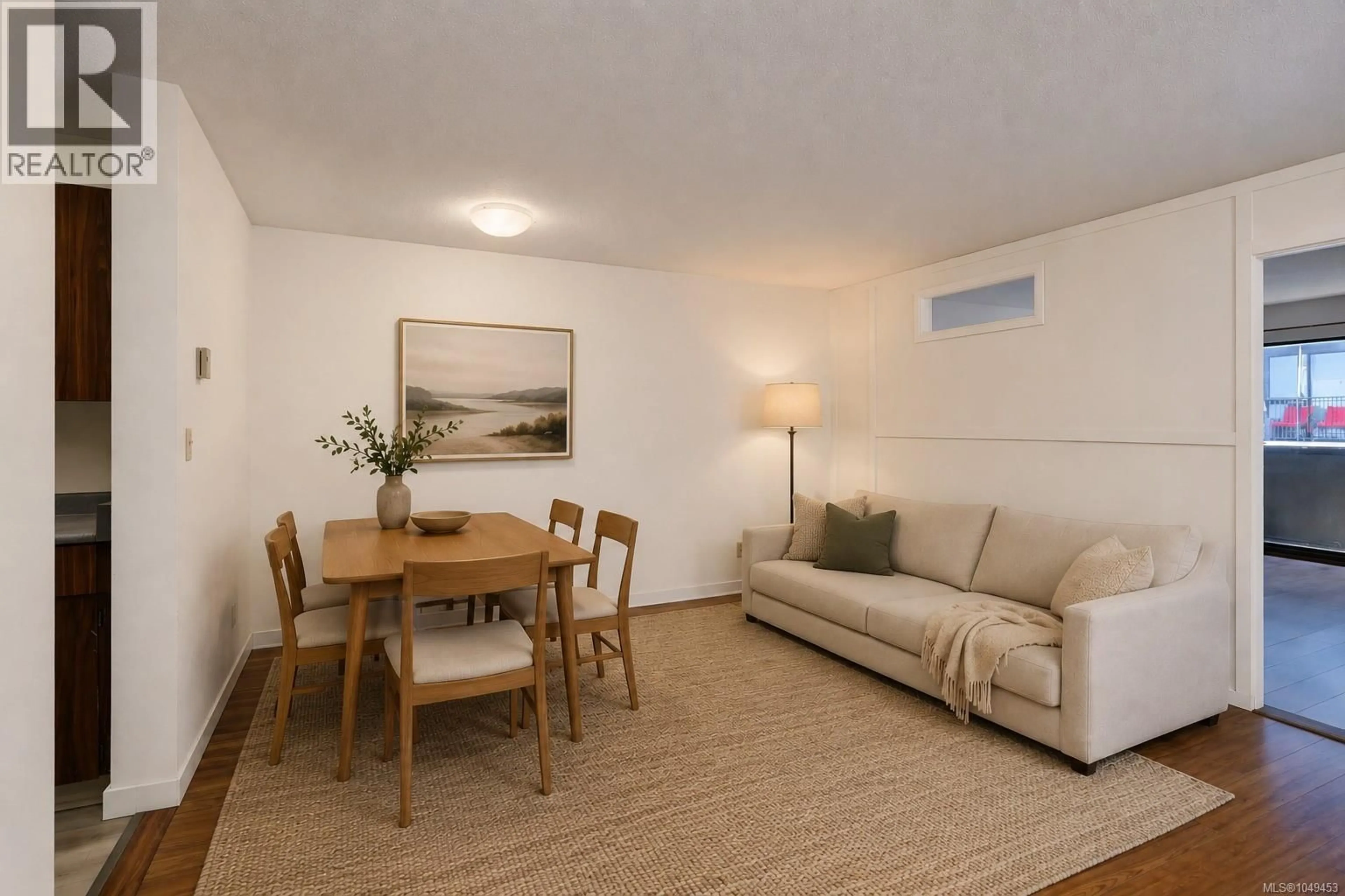 Living room with furniture, wood/laminate floor for 302 - 755 HILLSIDE AVENUE, Victoria British Columbia V8T5B3