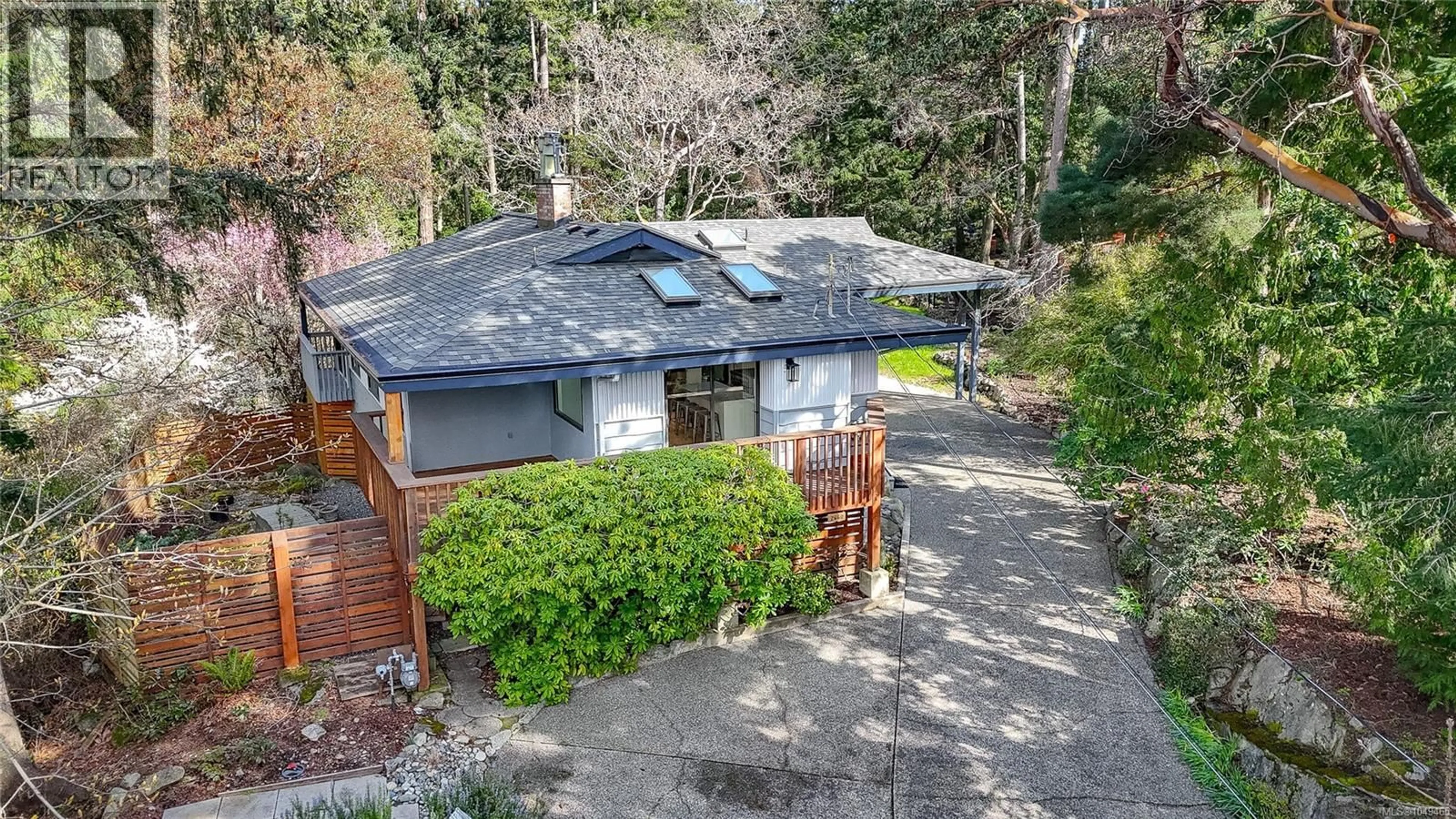 A pic from outside/outdoor area/front of a property/back of a property/a pic from drone, street for 2660 MACDONALD DRIVE EAST, Saanich British Columbia V8N1X9