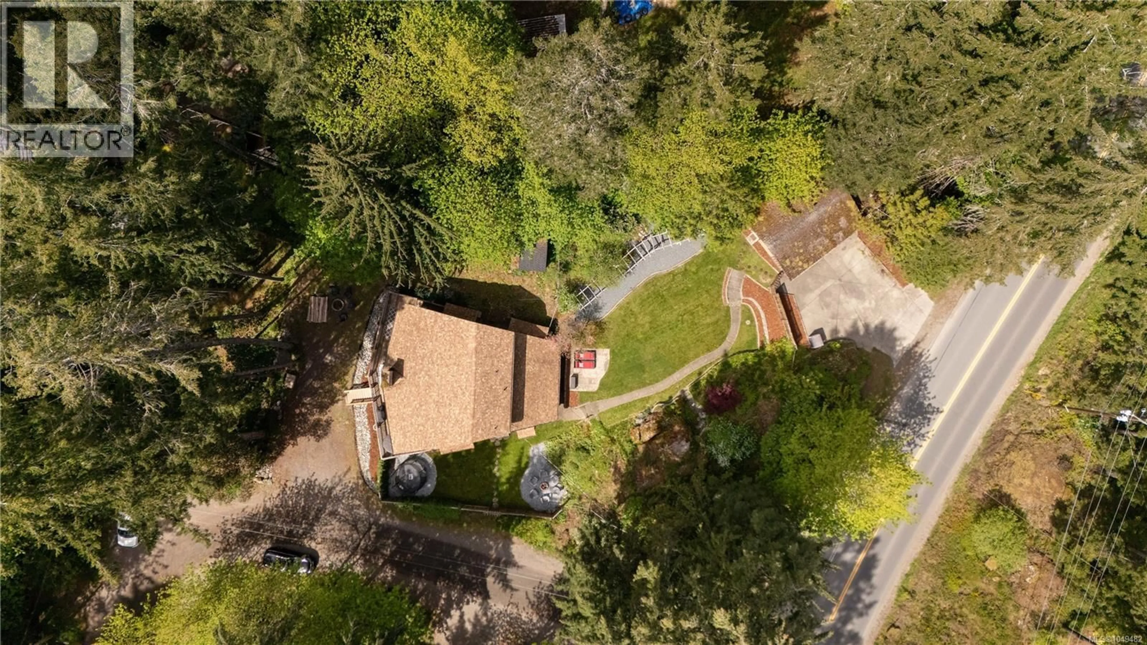A pic from outside/outdoor area/front of a property/back of a property/a pic from drone, street for 2446 SOMMER LANE, Shawnigan Lake British Columbia V0R2W1