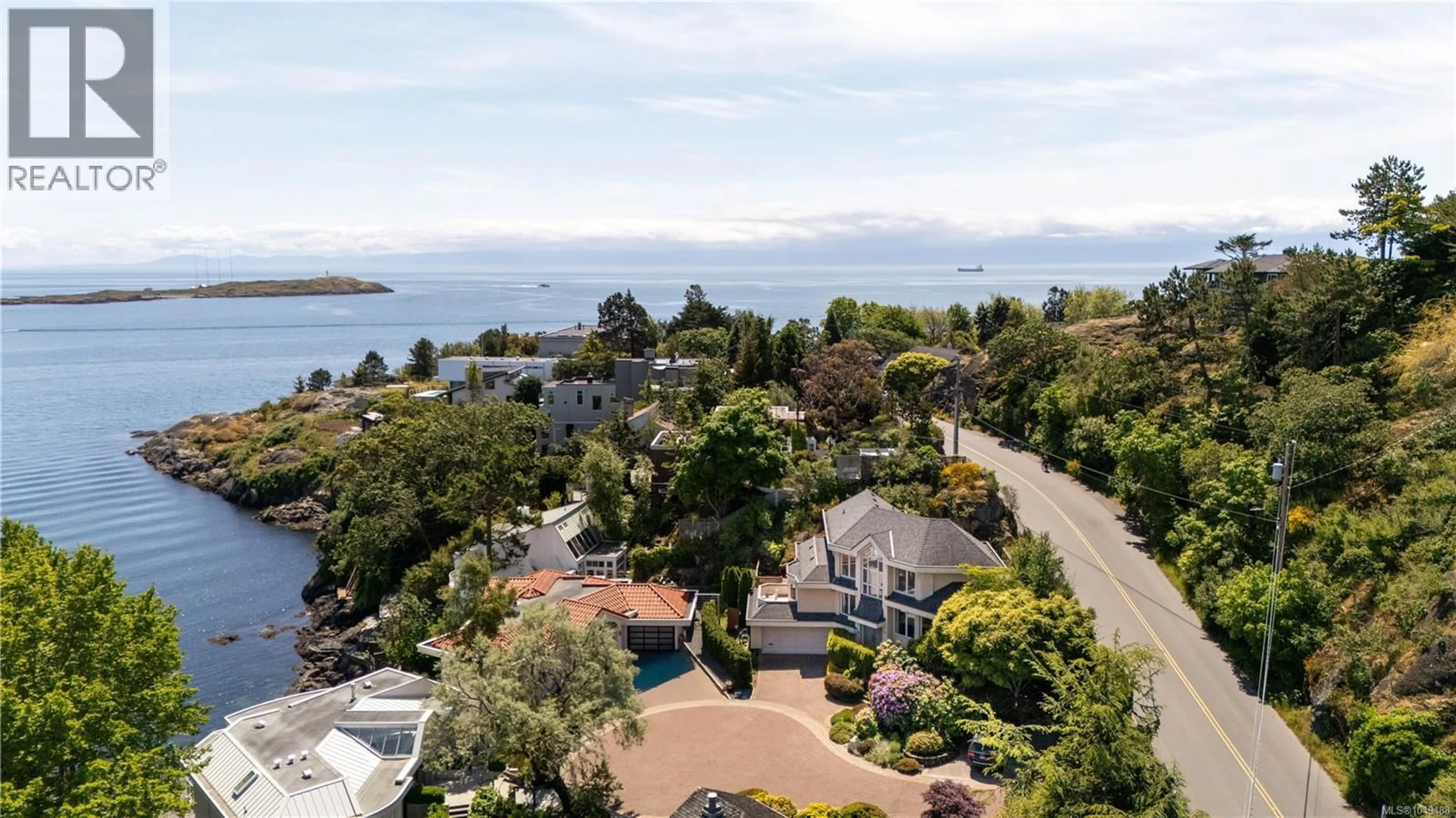 A pic from outside/outdoor area/front of a property/back of a property/a pic from drone, water/lake/river/ocean view for 335 KING GEORGE TERRACE, Oak Bay British Columbia V8S2J8