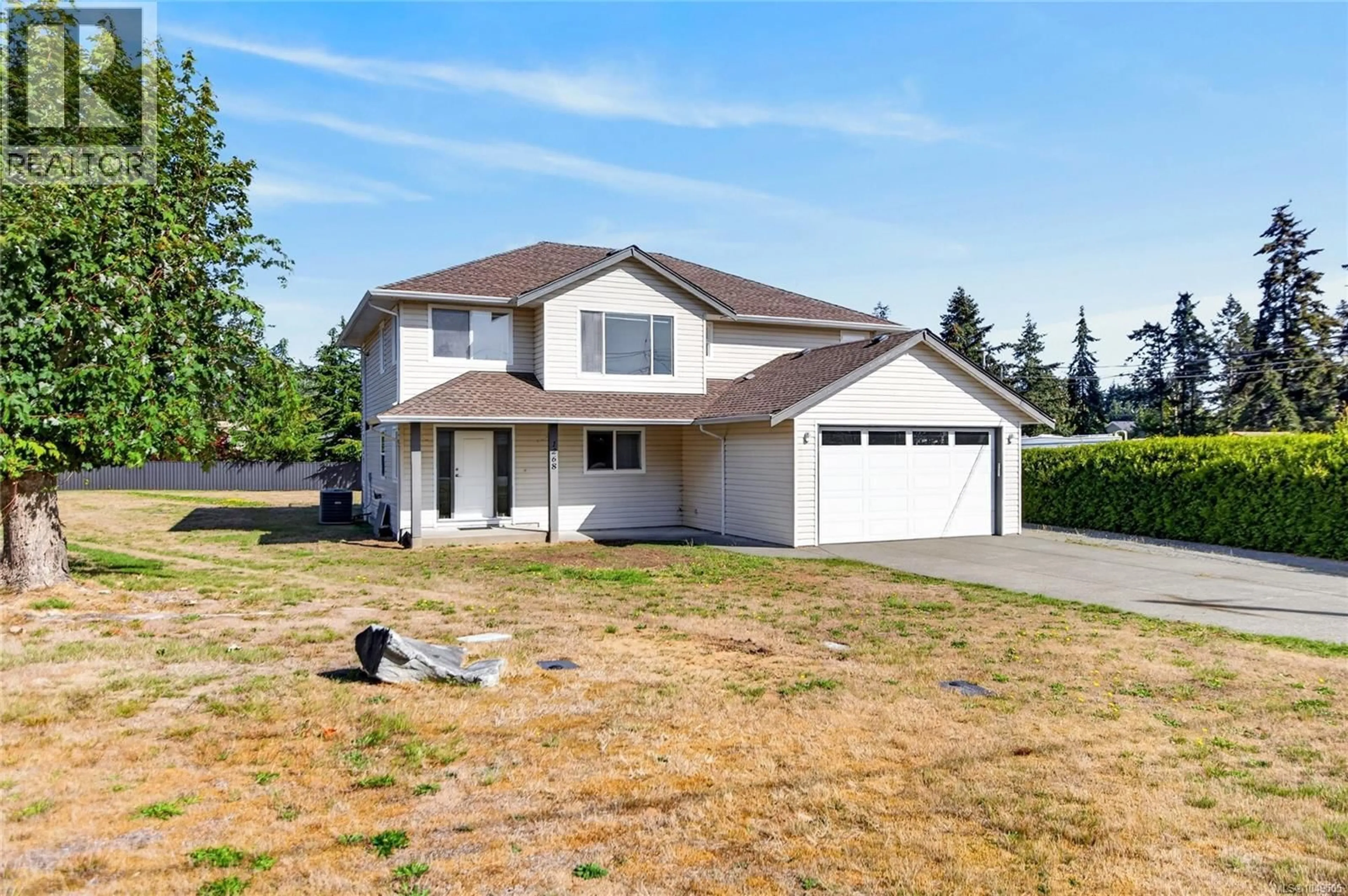 Home with vinyl exterior material, street for 1268 MILLER ROAD, Comox British Columbia V9M4C3
