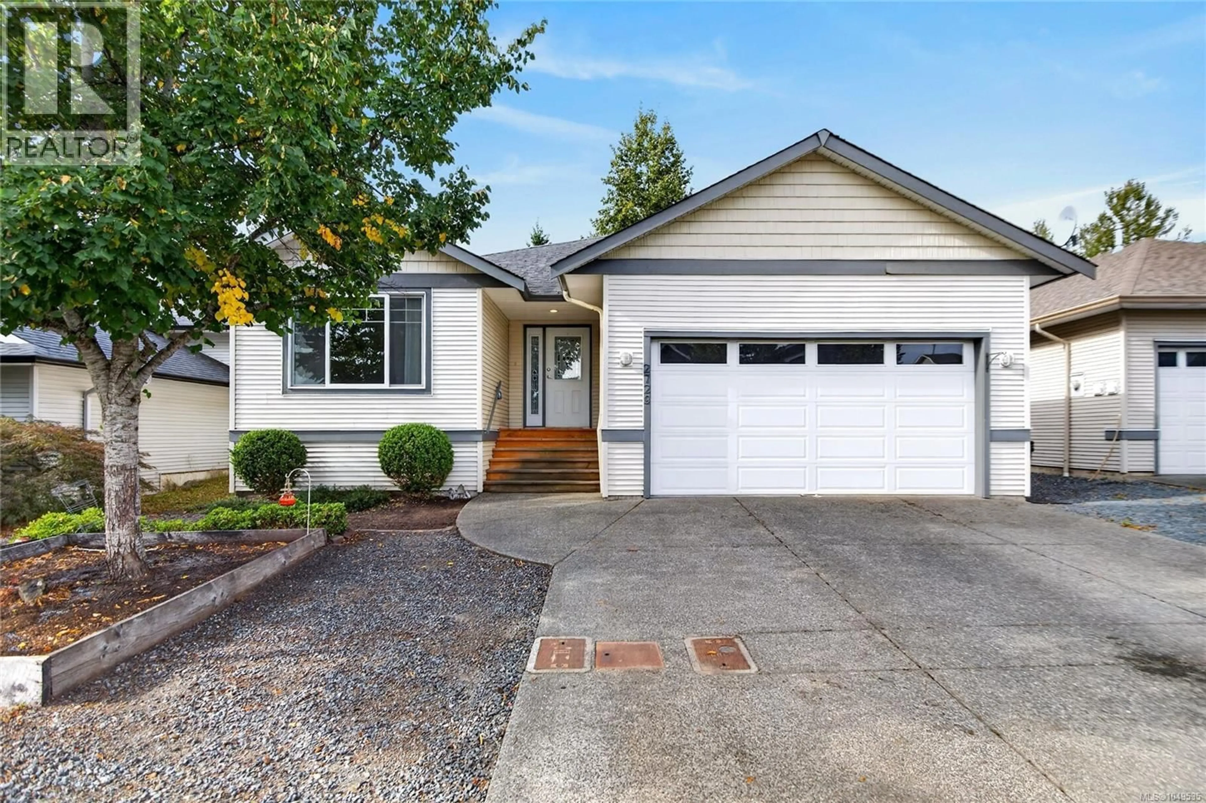 Home with vinyl exterior material, street for 2729 KENDAL AVENUE, Cumberland British Columbia V0R1S0
