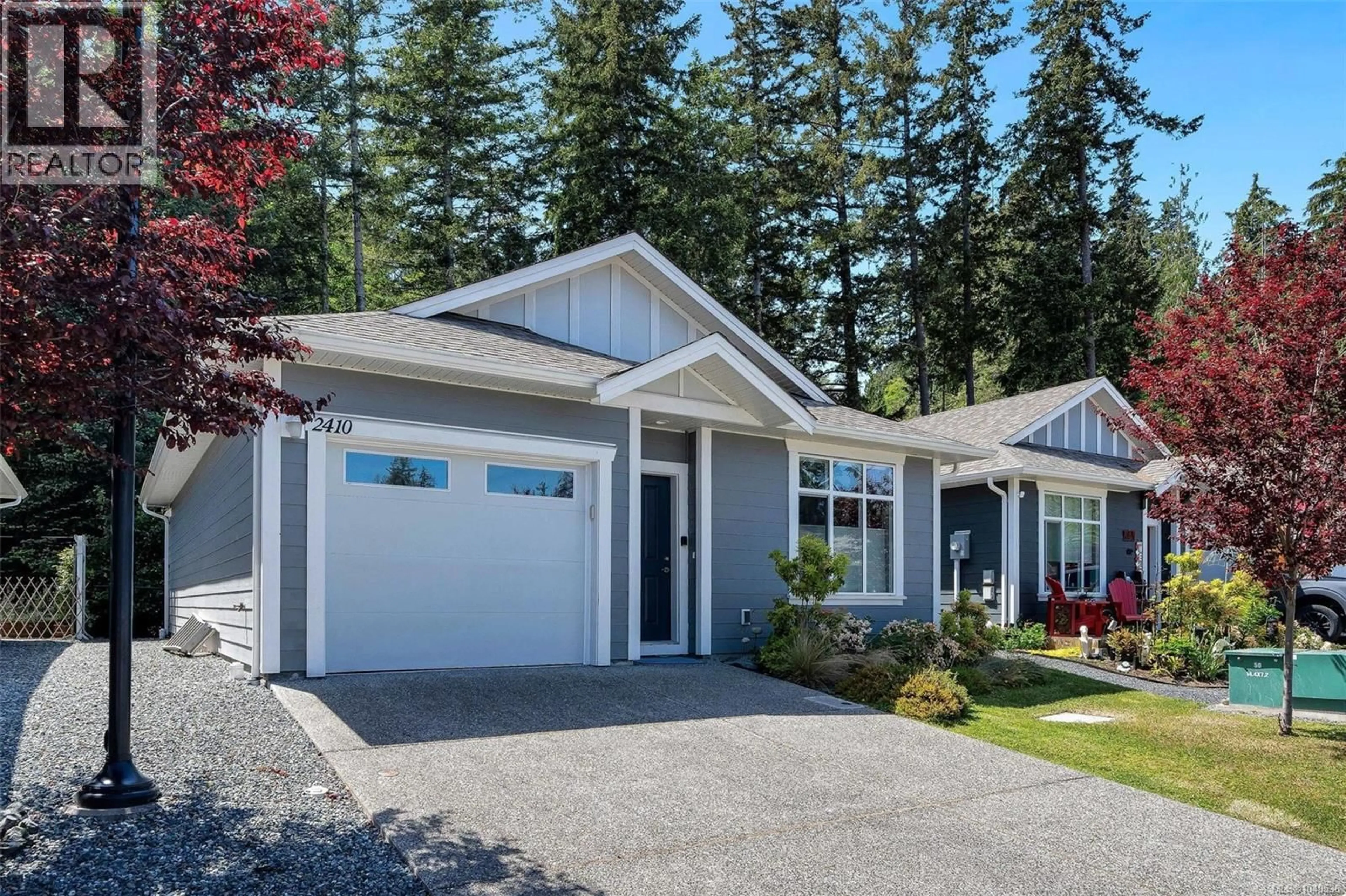 Home with vinyl exterior material, street for 2410 FERN WAY, Sooke British Columbia V9Z0Y4