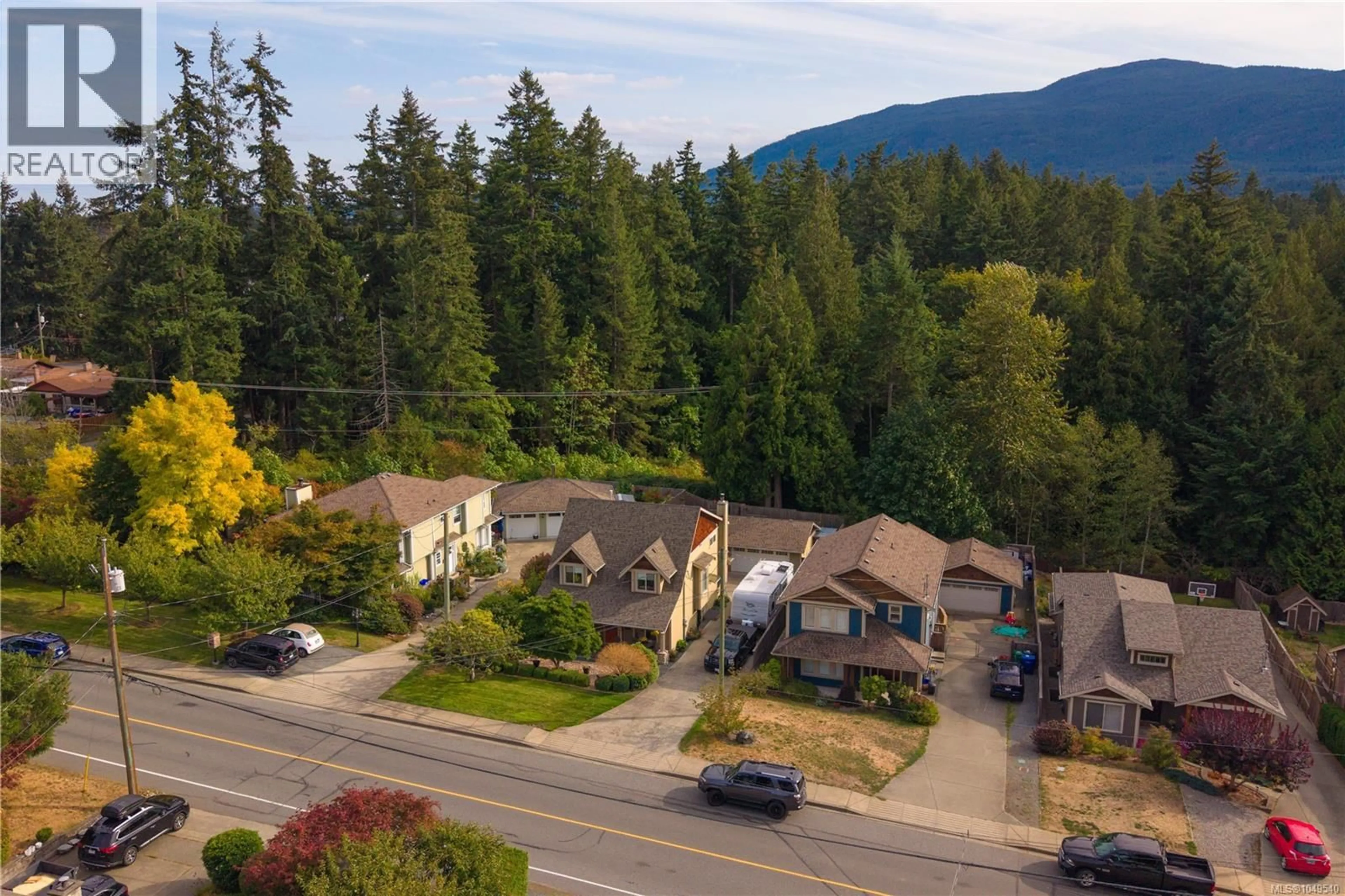 A pic from outside/outdoor area/front of a property/back of a property/a pic from drone, mountain view for 5419 DUNSTER ROAD, Nanaimo British Columbia V9T6S3
