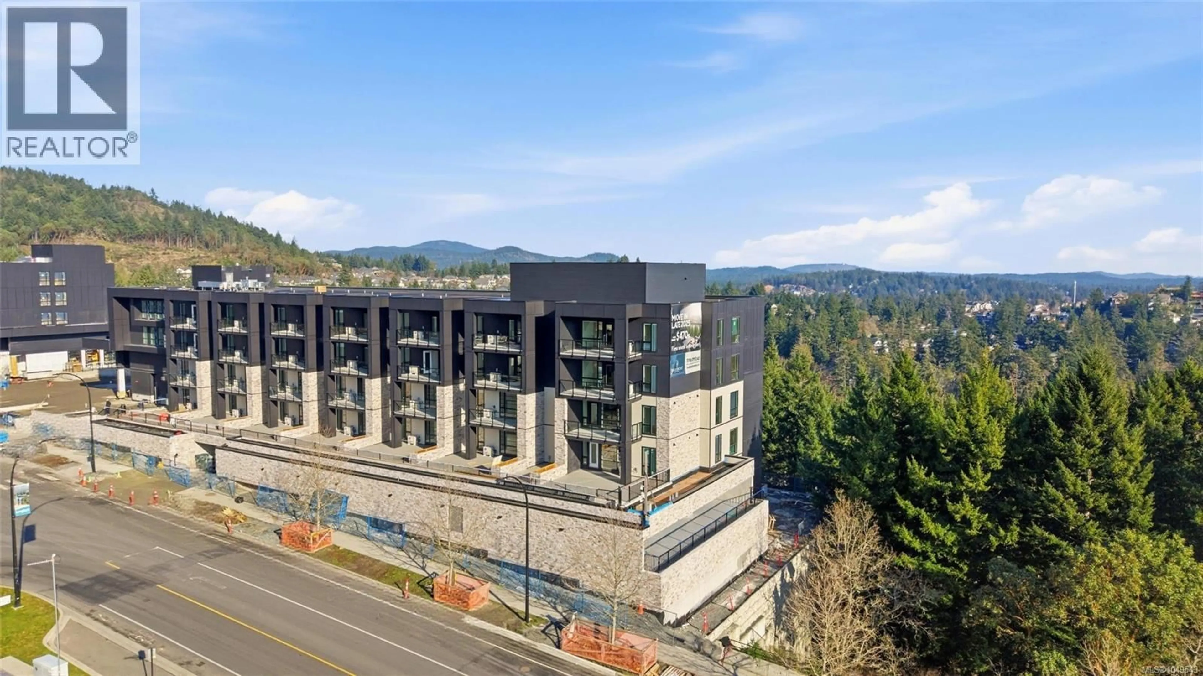 A pic from outside/outdoor area/front of a property/back of a property/a pic from drone, mountain view for 613 - 2337 BEAR MOUNTAIN PARKWAY, Langford British Columbia V9B6V1