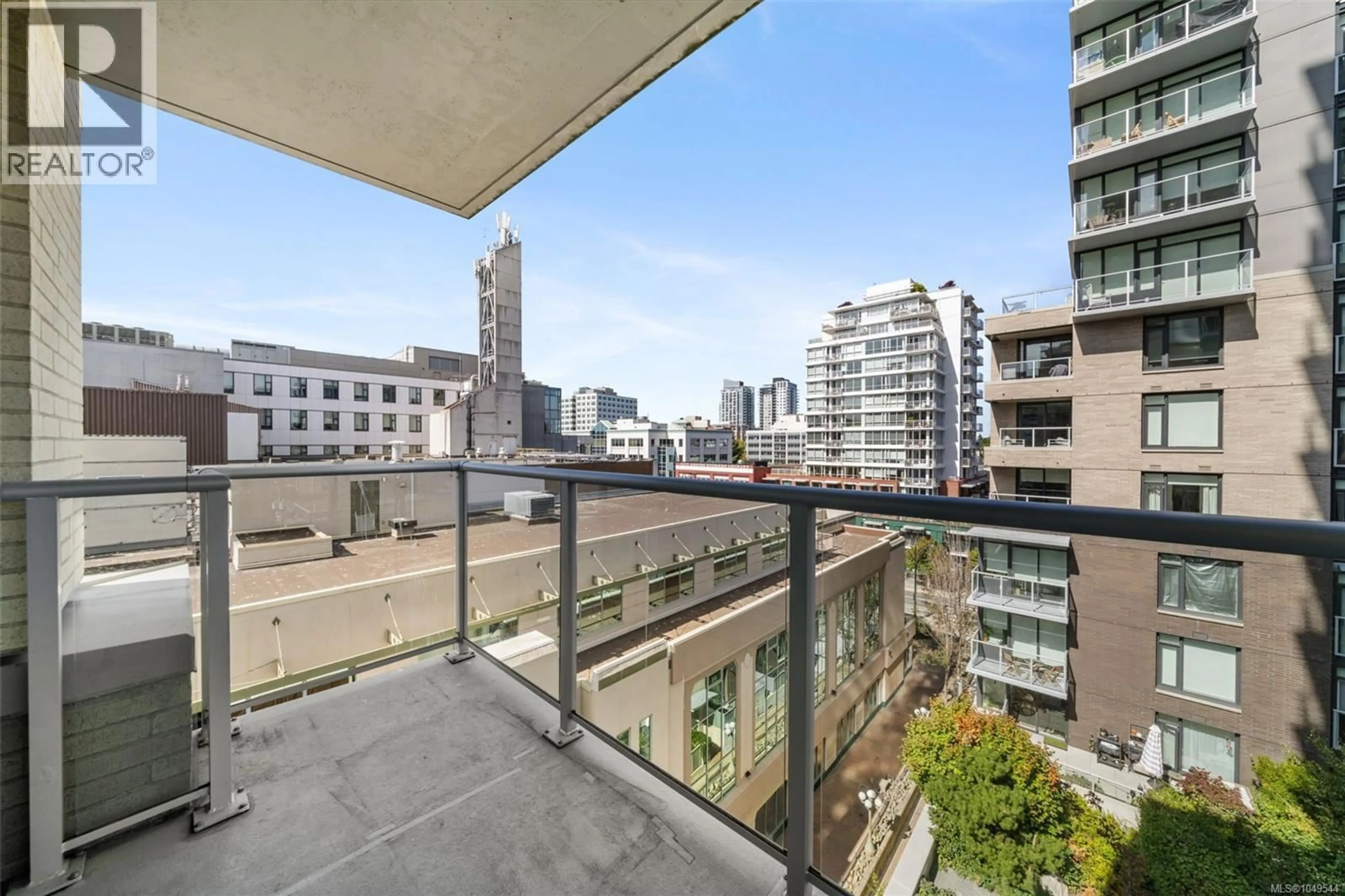 Balcony in the apartment, city buildings view from balcony for 703 - 848 YATES STREET, Victoria British Columbia V8W0G2