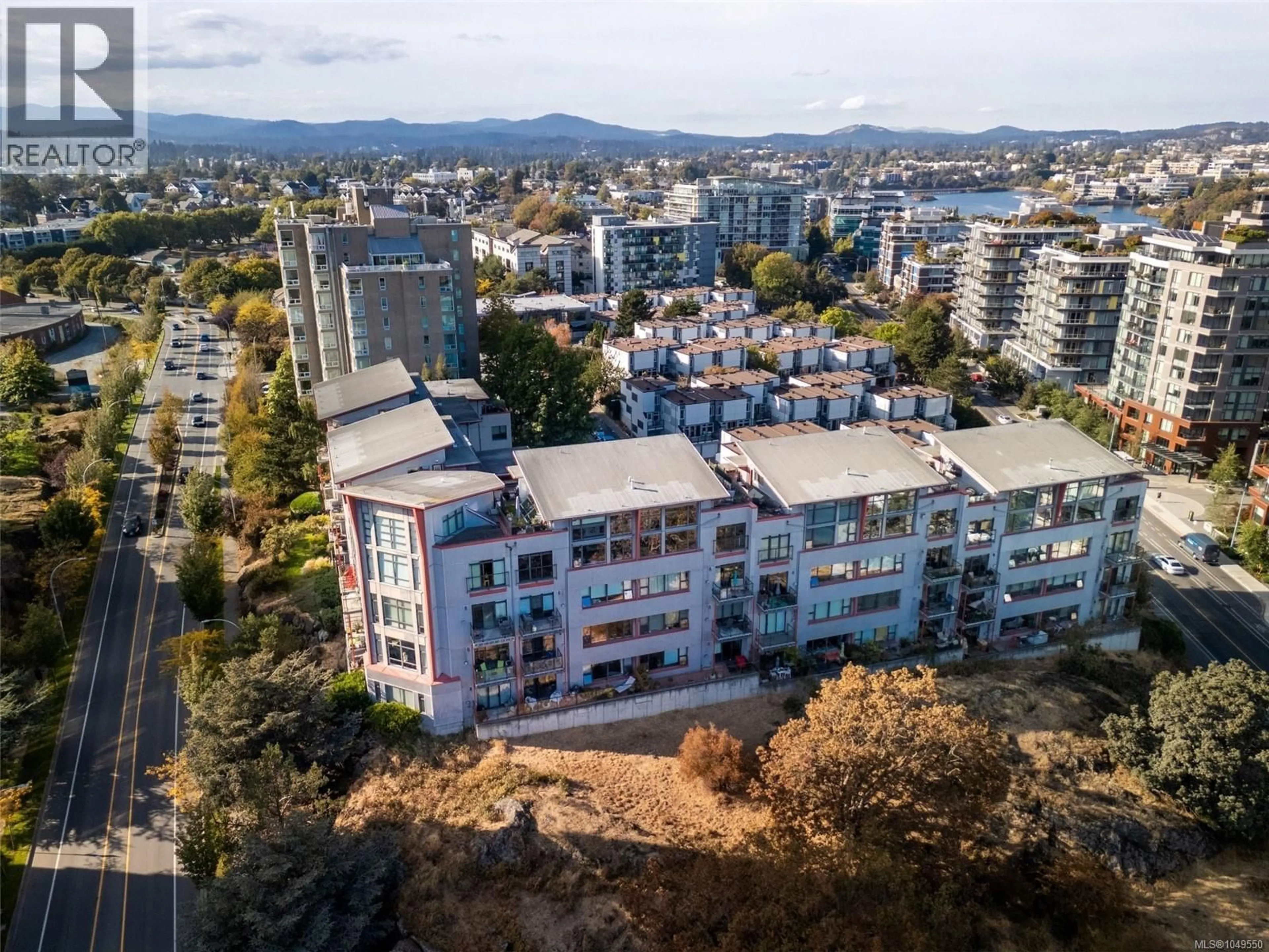 A pic from outside/outdoor area/front of a property/back of a property/a pic from drone, city buildings view from balcony for 212 - 455 SITKUM ROAD, Victoria British Columbia V9A7N9