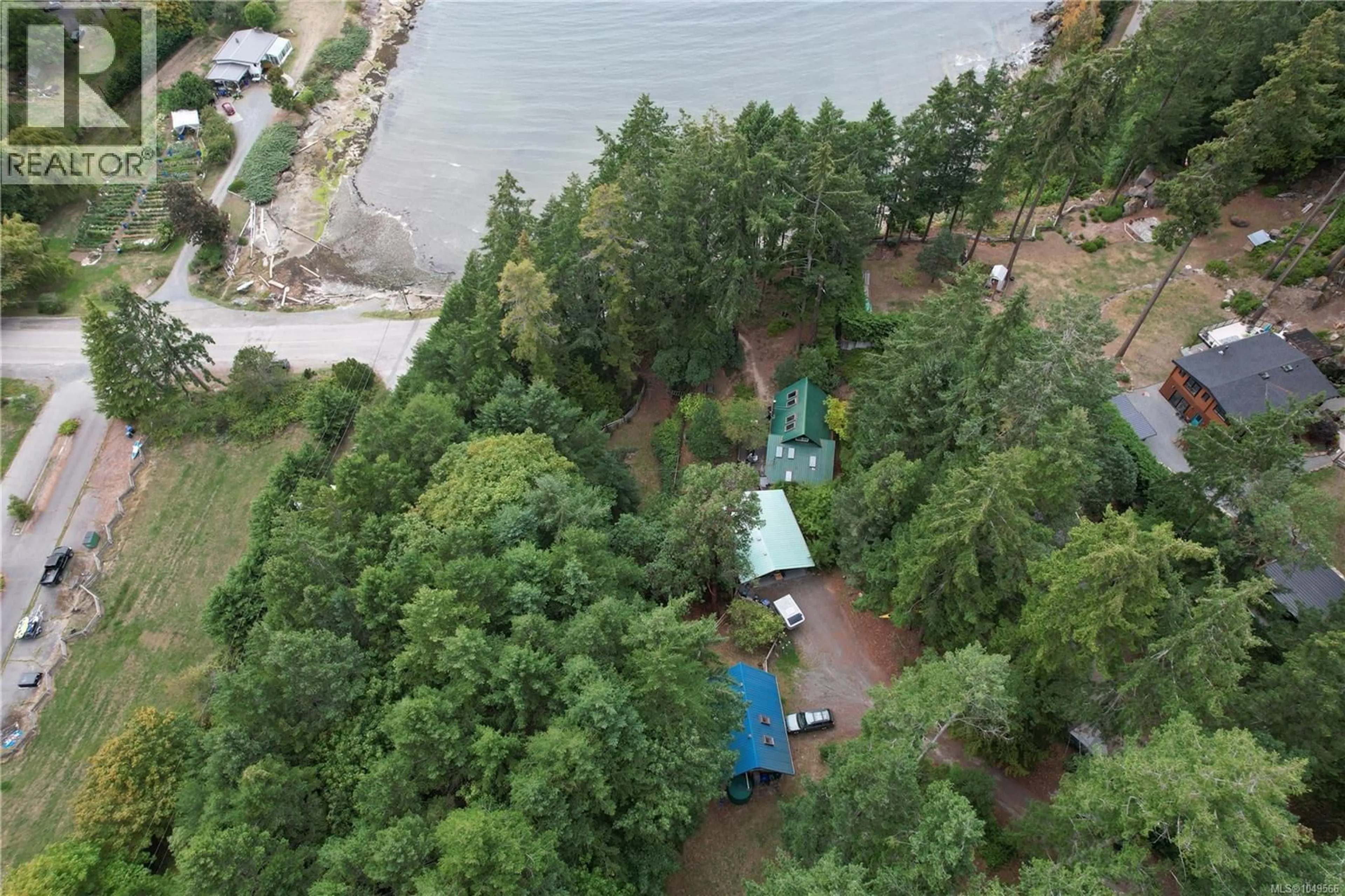 A pic from outside/outdoor area/front of a property/back of a property/a pic from drone, water/lake/river/ocean view for 871 SHARIE ROAD, Gabriola Island British Columbia V0R1X2