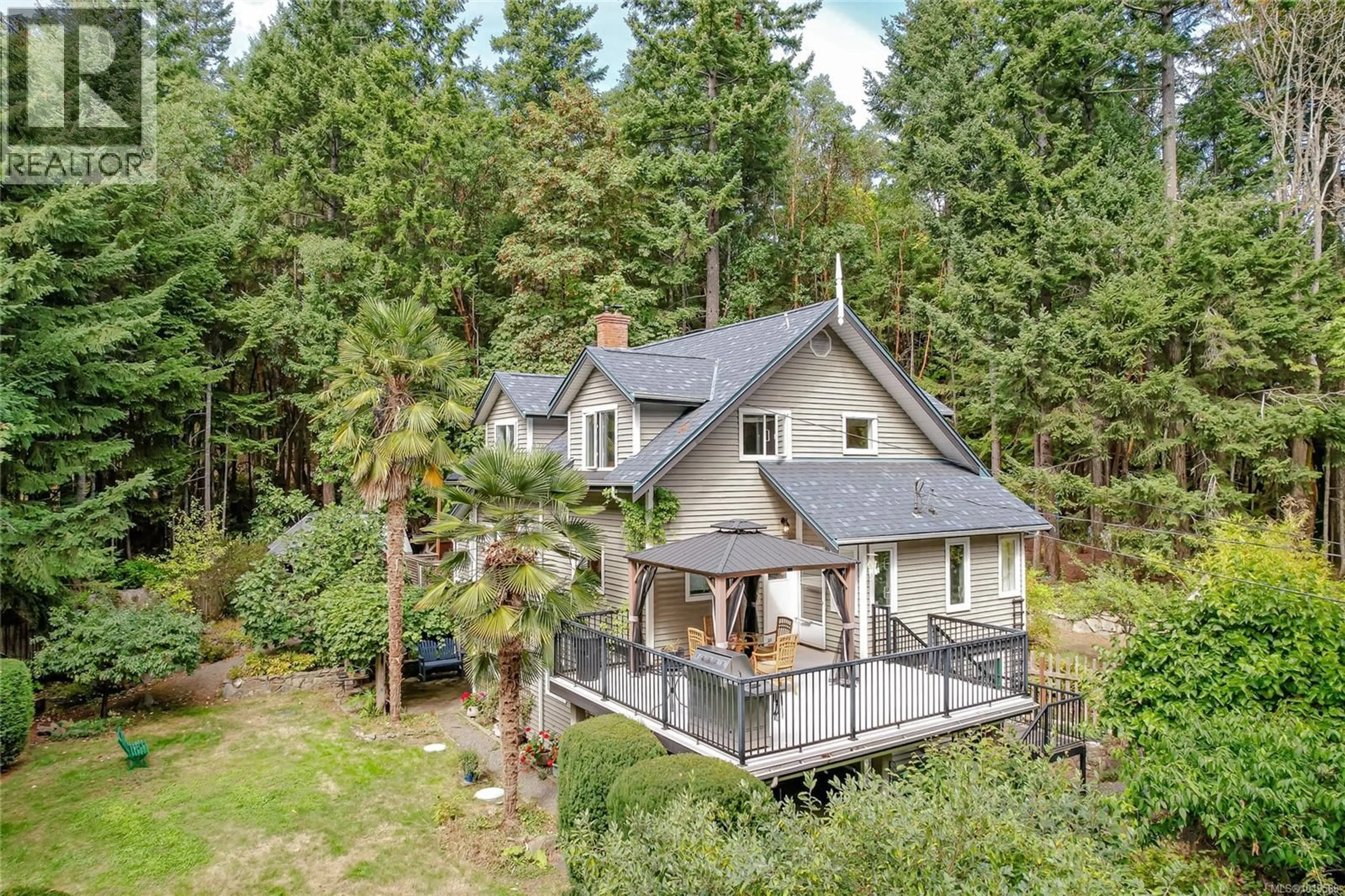 A pic from outside/outdoor area/front of a property/back of a property/a pic from drone, forest/trees view for 154 HIGH HILL ROAD, Salt Spring British Columbia V8K2N6
