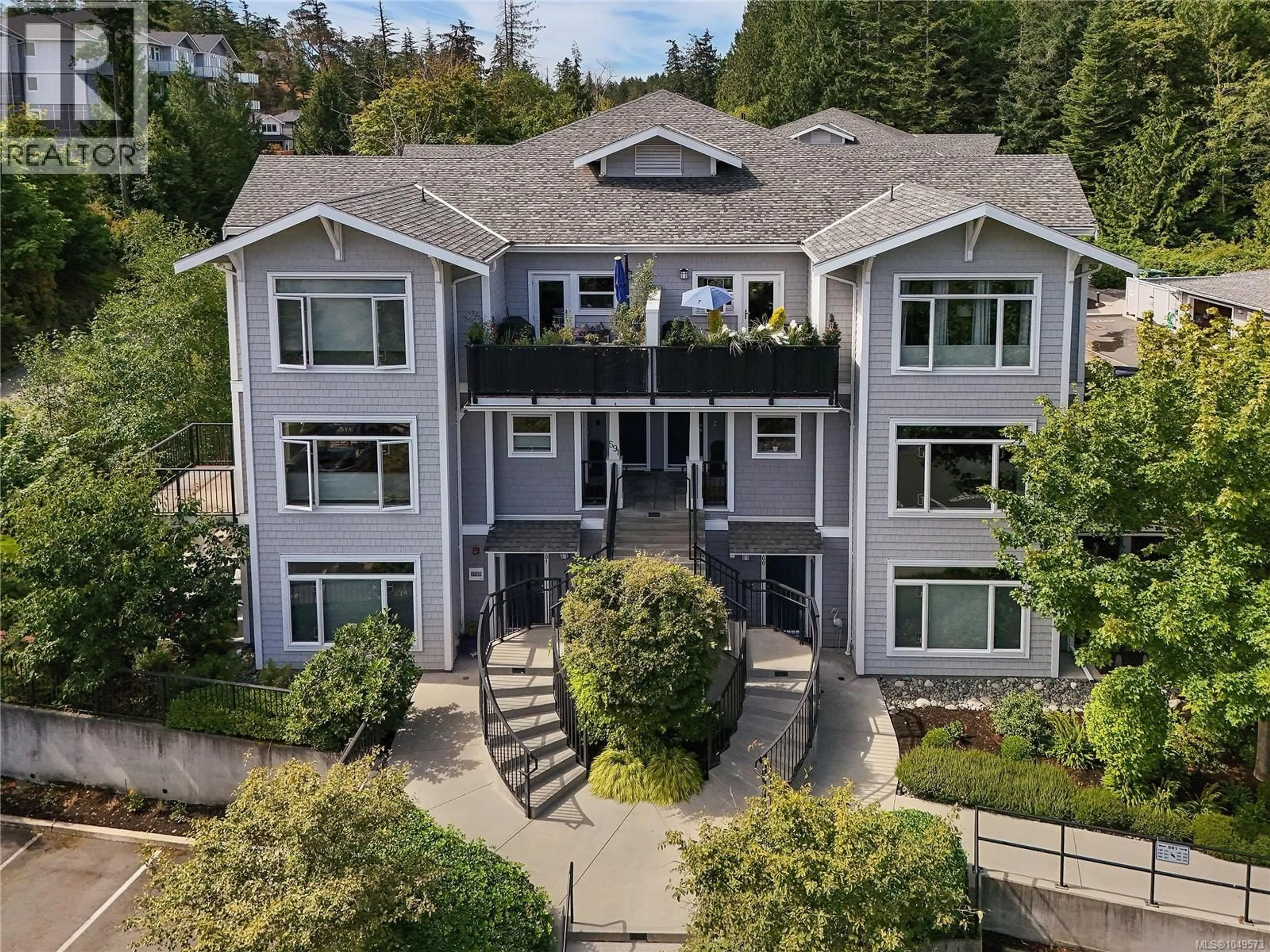 A pic from outside/outdoor area/front of a property/back of a property/a pic from drone, mountain view for 201 - 591 LATORIA ROAD, Langford British Columbia V8W2T6