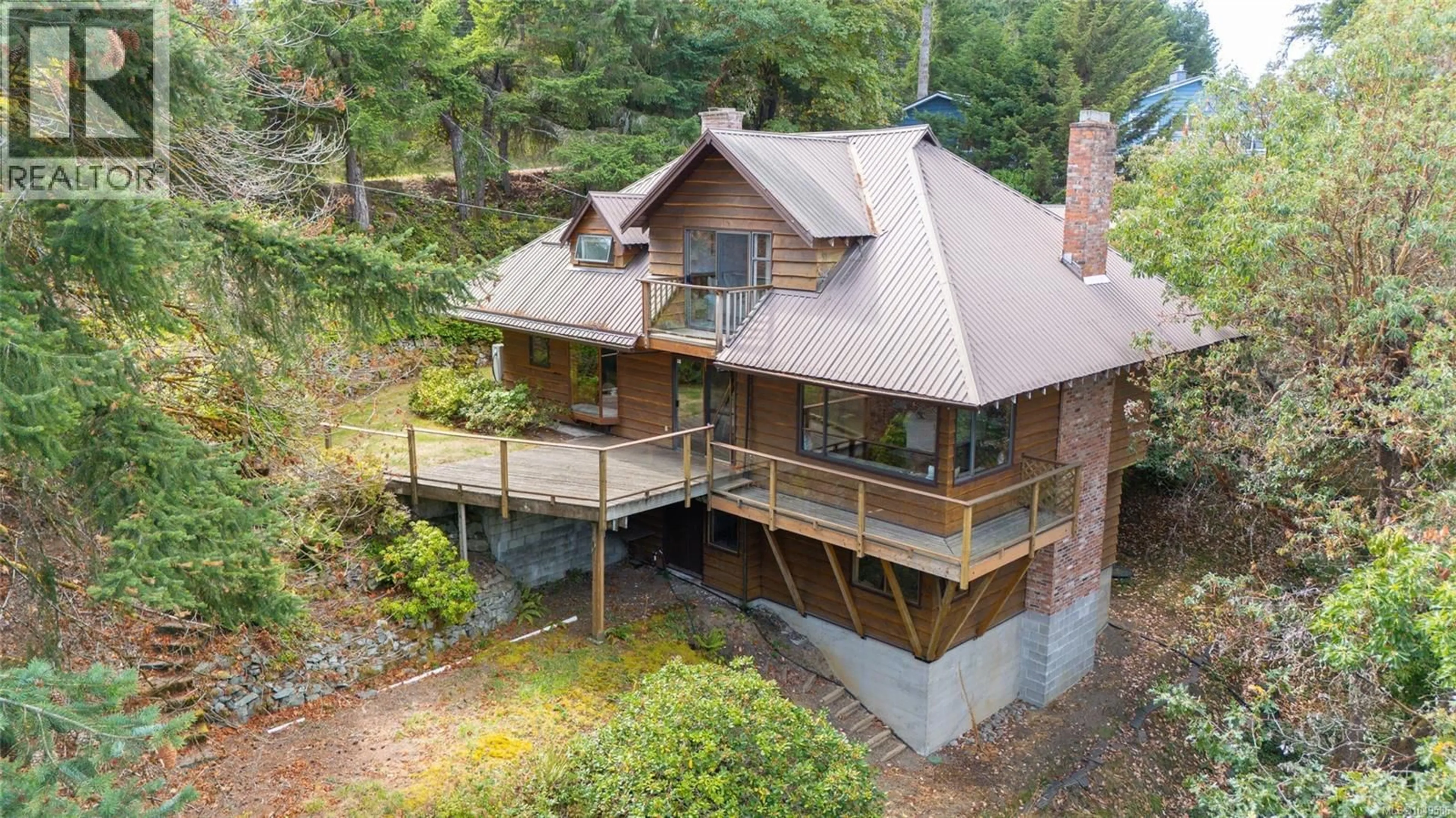 A pic from outside/outdoor area/front of a property/back of a property/a pic from drone, unknown for 6697 GENOA BAY ROAD, Duncan British Columbia V9L5Y7