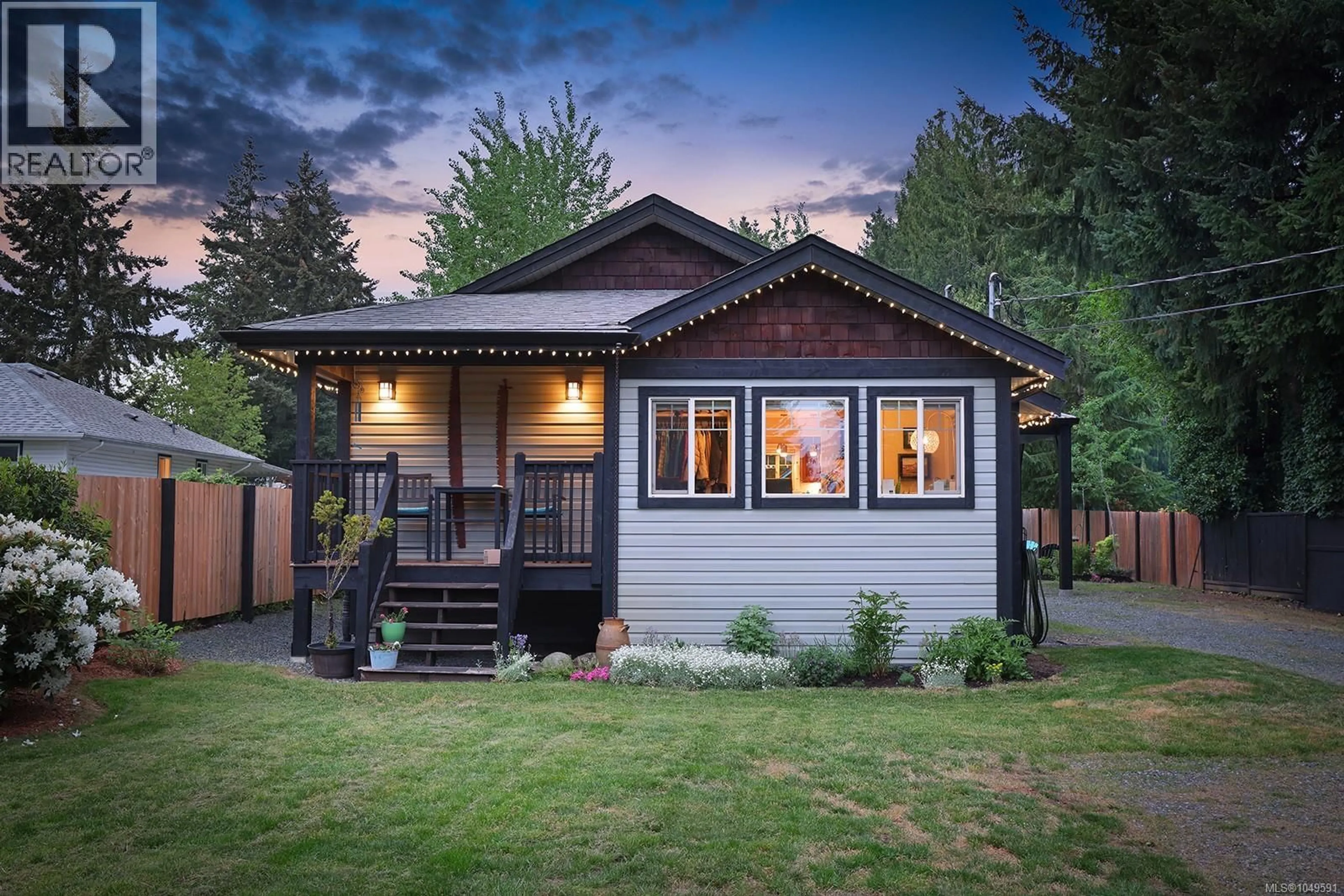 Home with vinyl exterior material, street for 4680 CUMBERLAND ROAD, Cumberland British Columbia V0R1S0