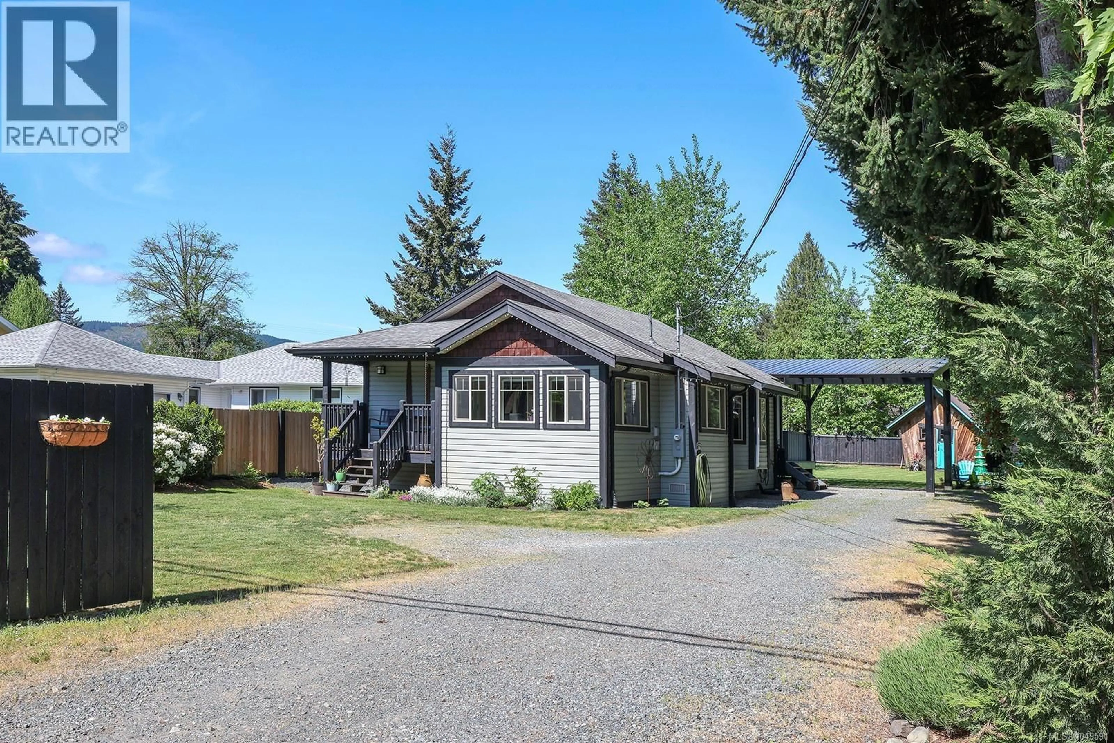 Home with vinyl exterior material, street for 4680 CUMBERLAND ROAD, Cumberland British Columbia V0R1S0