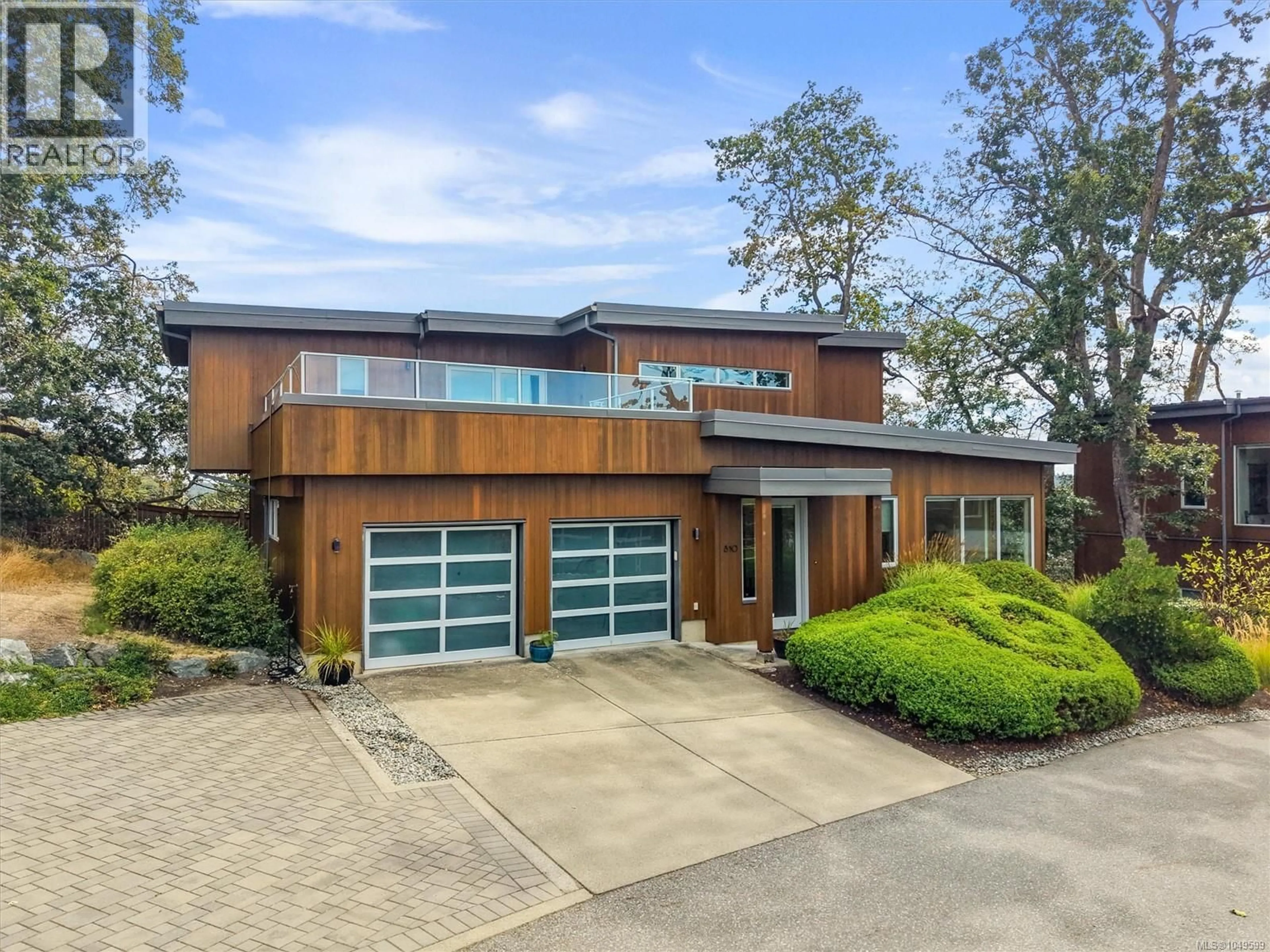 Home with brick exterior material, street for 810 RAINBOW RIDGE LANE, Saanich British Columbia V8X0A6