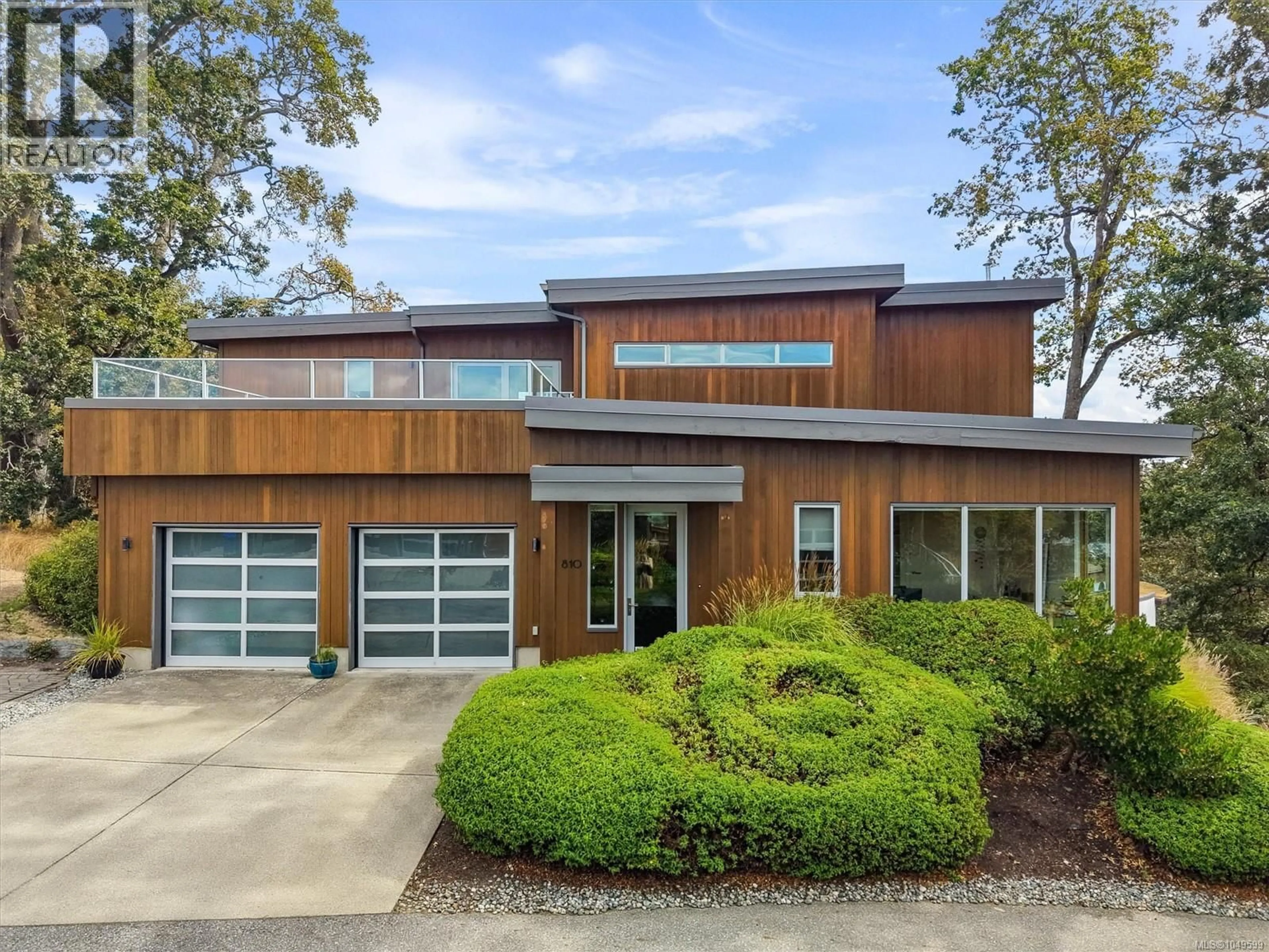 Home with brick exterior material, street for 810 RAINBOW RIDGE LANE, Saanich British Columbia V8X0A6