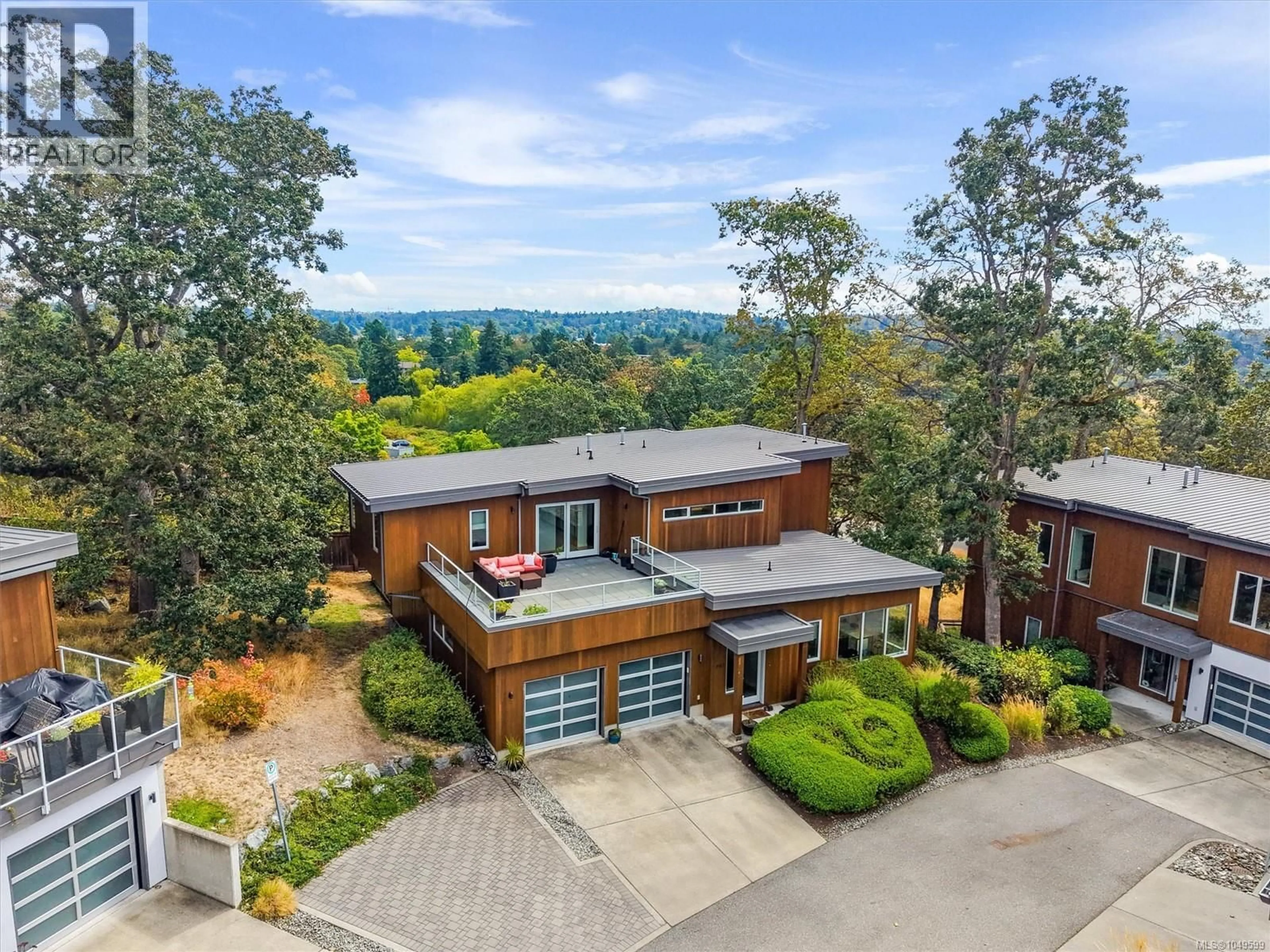Home with brick exterior material, unknown for 810 RAINBOW RIDGE LANE, Saanich British Columbia V8X0A6