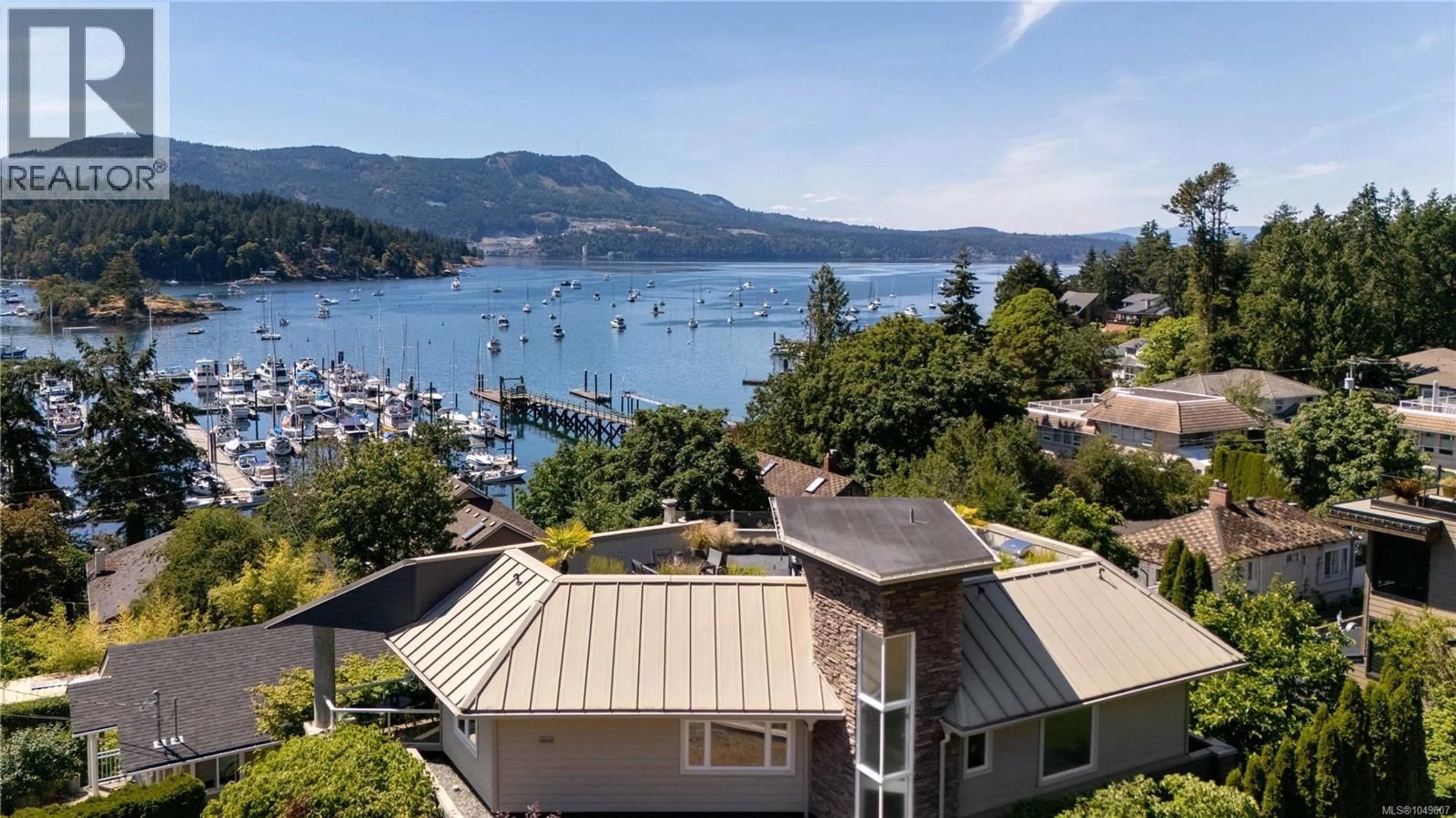 A pic from outside/outdoor area/front of a property/back of a property/a pic from drone, water/lake/river/ocean view for 916 GRILSE LANE, Central Saanich British Columbia V8M1B5
