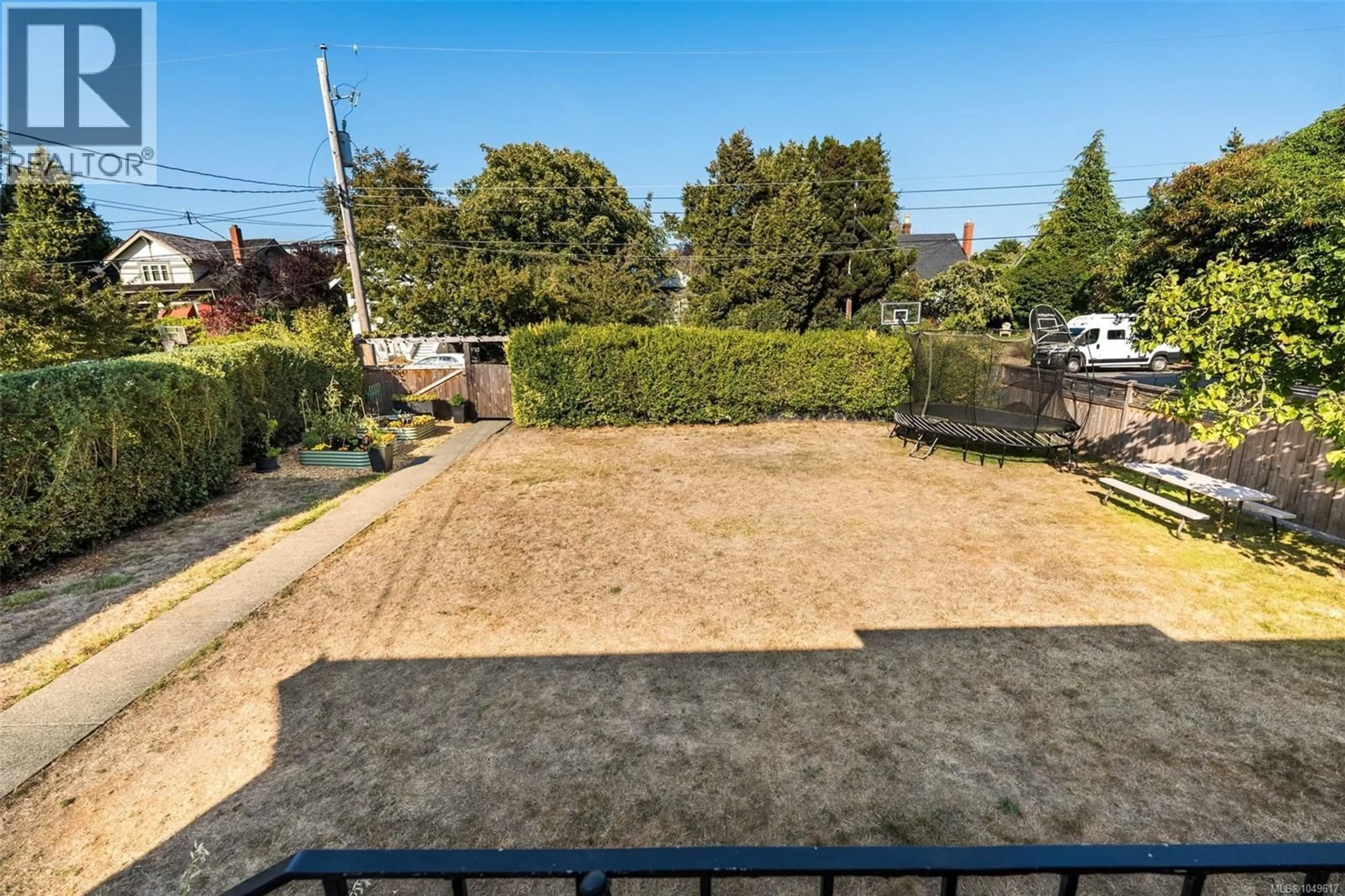 A pic from outside/outdoor area/front of a property/back of a property/a pic from drone, street for 1050 DEAL STREET, Oak Bay British Columbia V8S5G5