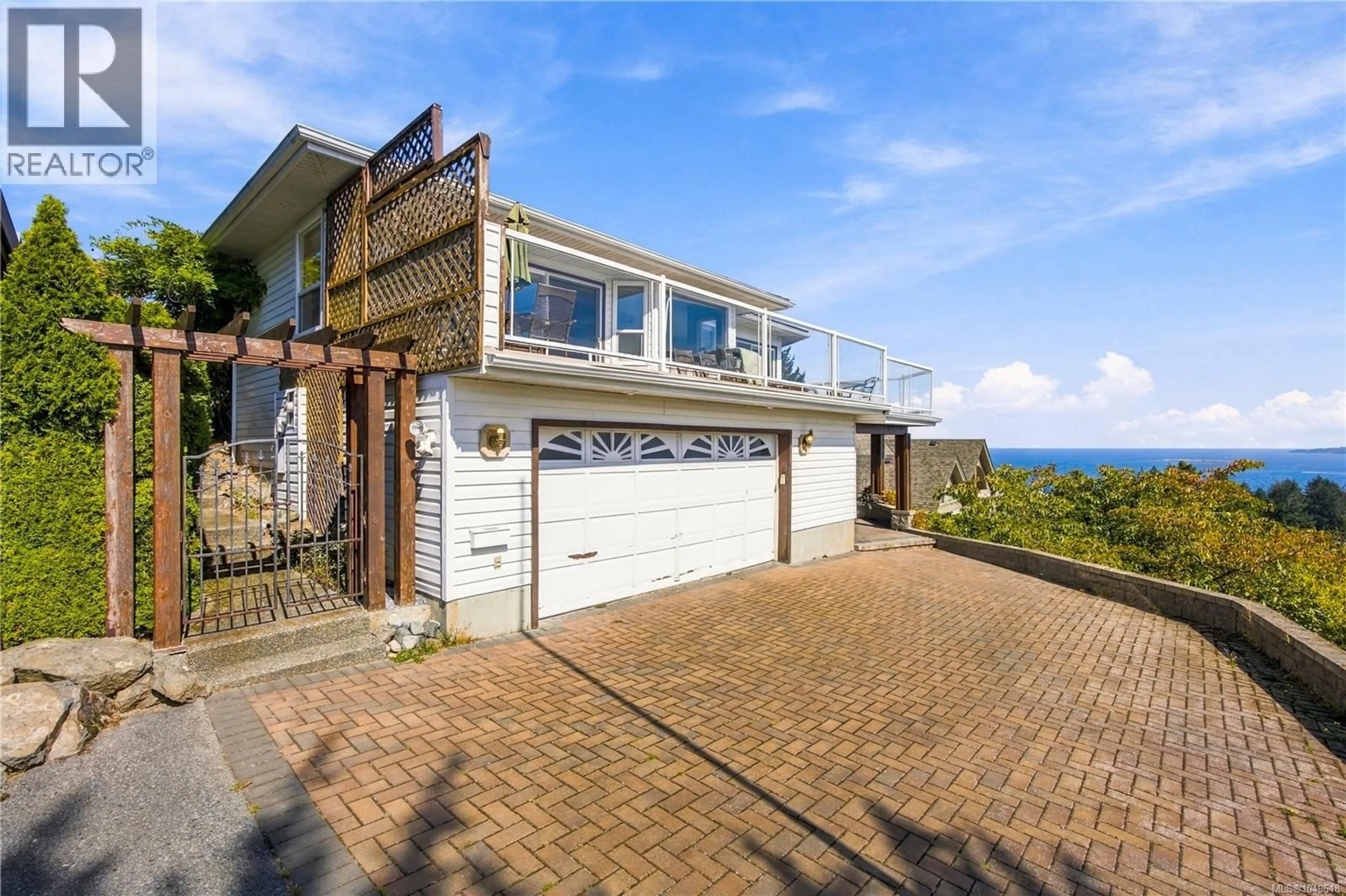 A pic from outside/outdoor area/front of a property/back of a property/a pic from drone, street for 3665 GLEN OAKS DRIVE, Nanaimo British Columbia V9T5L3