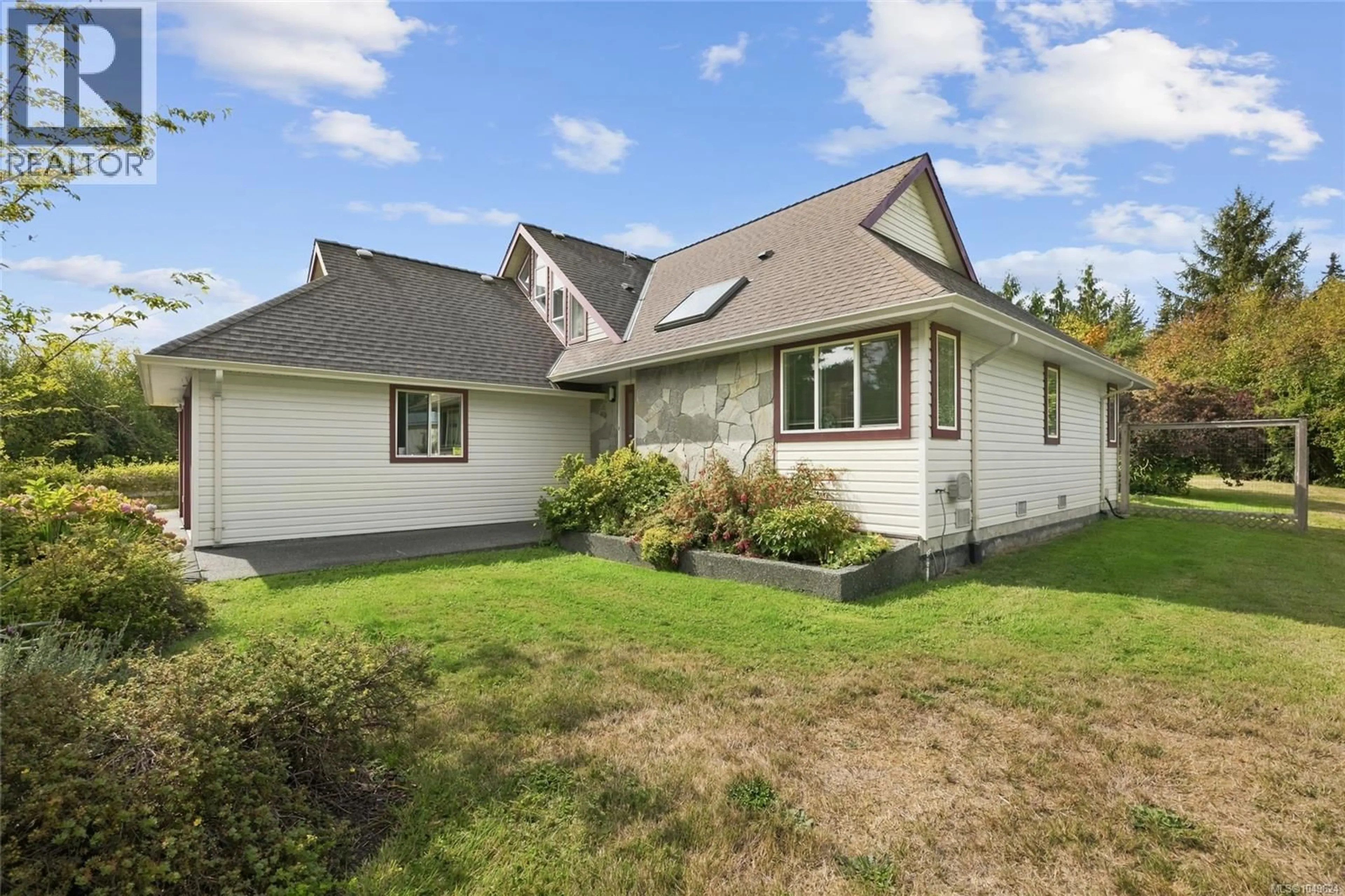 A pic from outside/outdoor area/front of a property/back of a property/a pic from drone, street for 2877 LAKE TRAIL ROAD, Courtenay British Columbia V9N9K8
