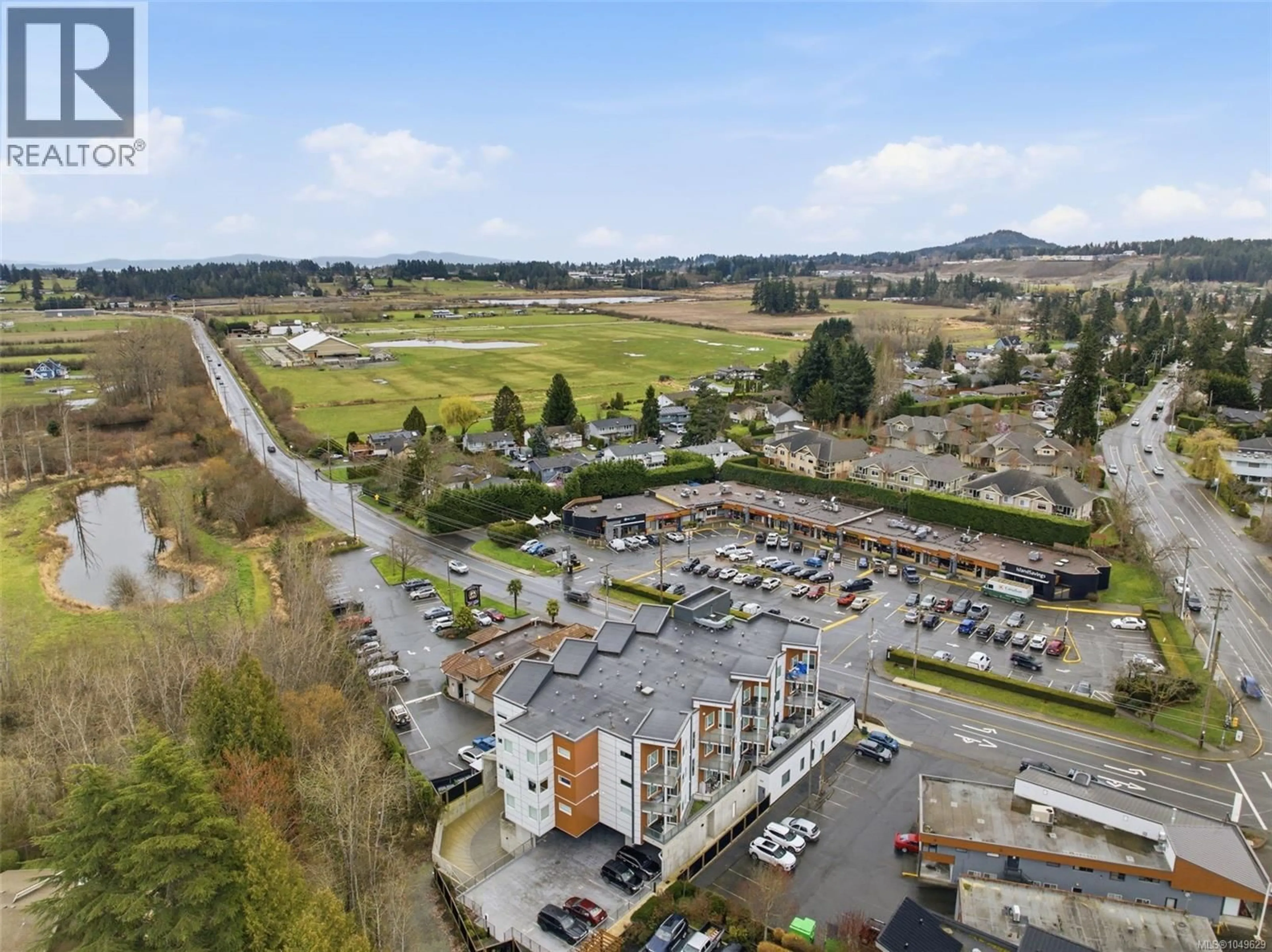A pic from outside/outdoor area/front of a property/back of a property/a pic from drone, mountain view for 301 - 7098 WALLACE DRIVE, Central Saanich British Columbia V8M1E9