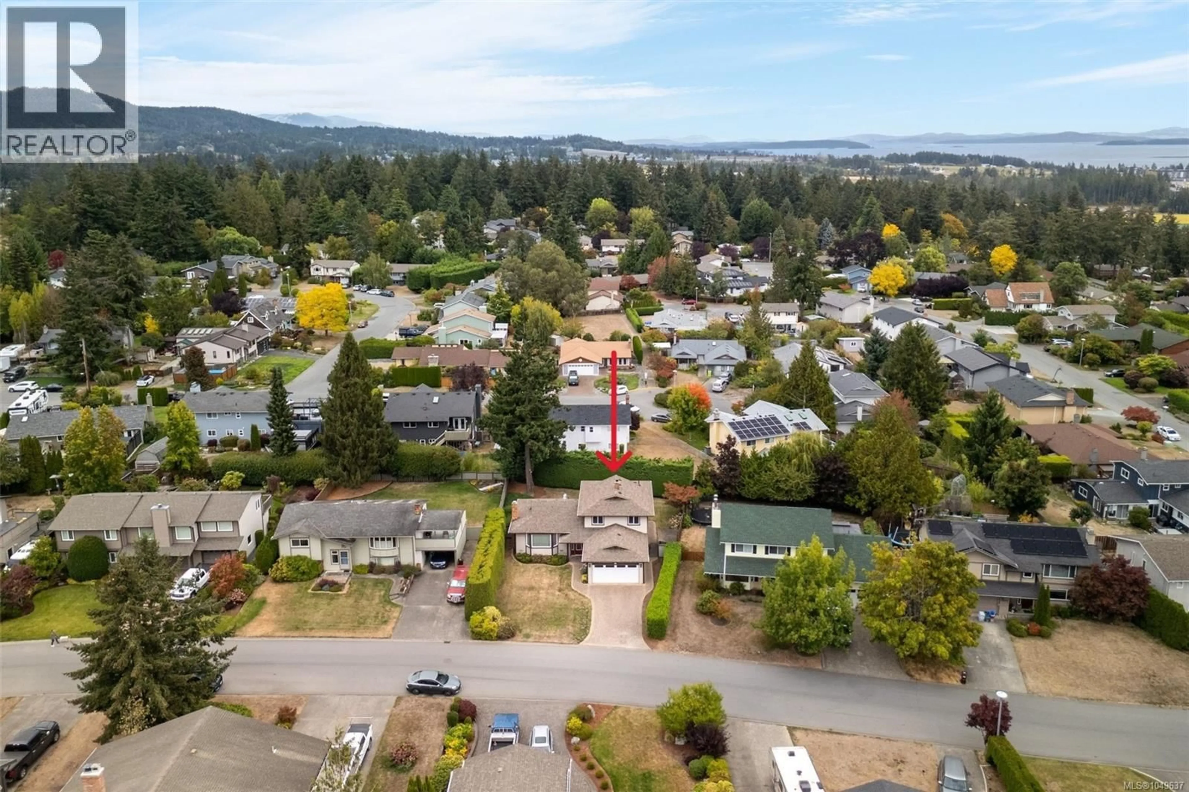 A pic from outside/outdoor area/front of a property/back of a property/a pic from drone, mountain view for 2056 SKYLINE CRESCENT, Central Saanich British Columbia V8M1M6