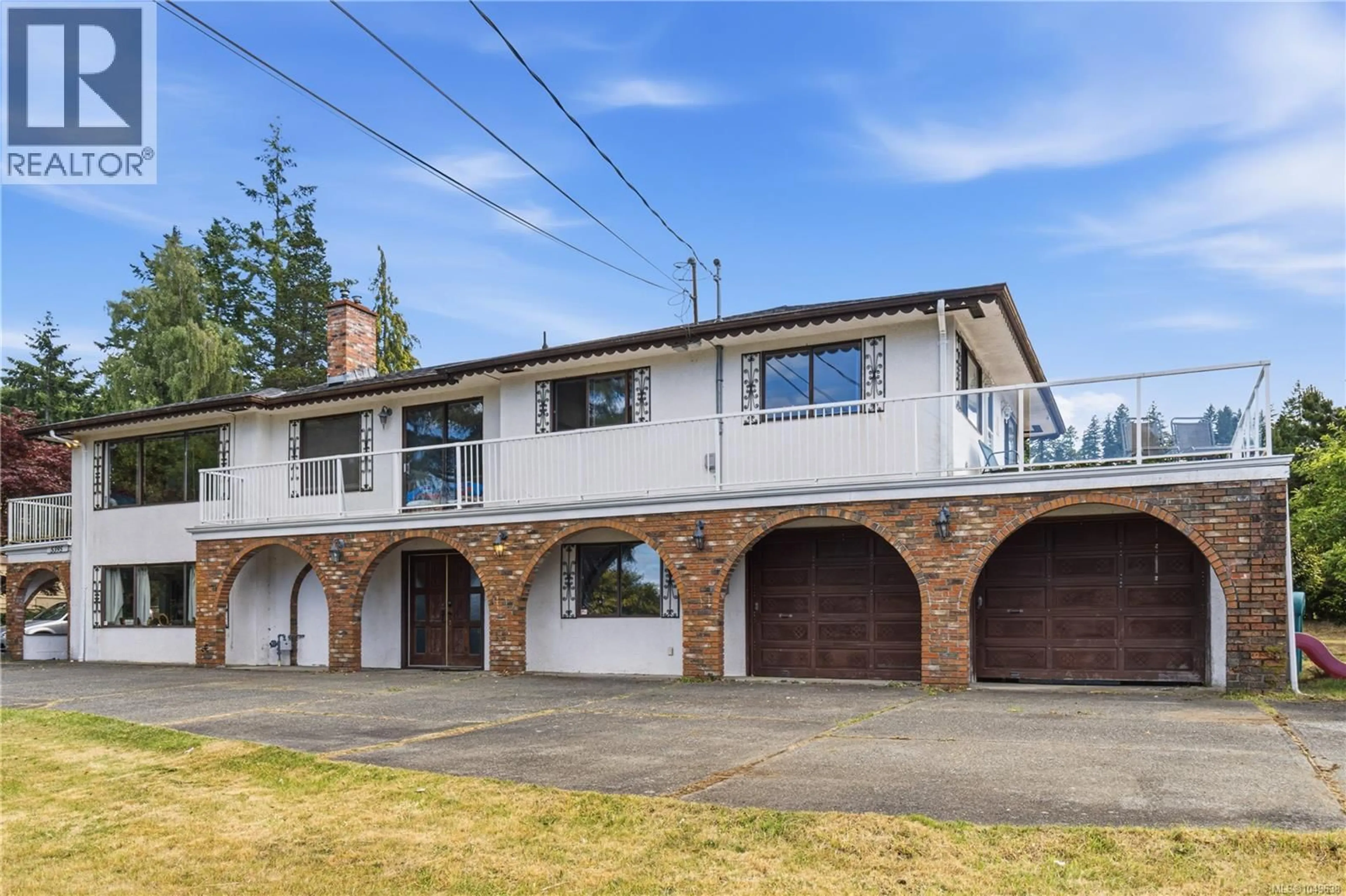 A pic from outside/outdoor area/front of a property/back of a property/a pic from drone, street for 5395 LOST LAKE ROAD, Nanaimo British Columbia V9T5E7