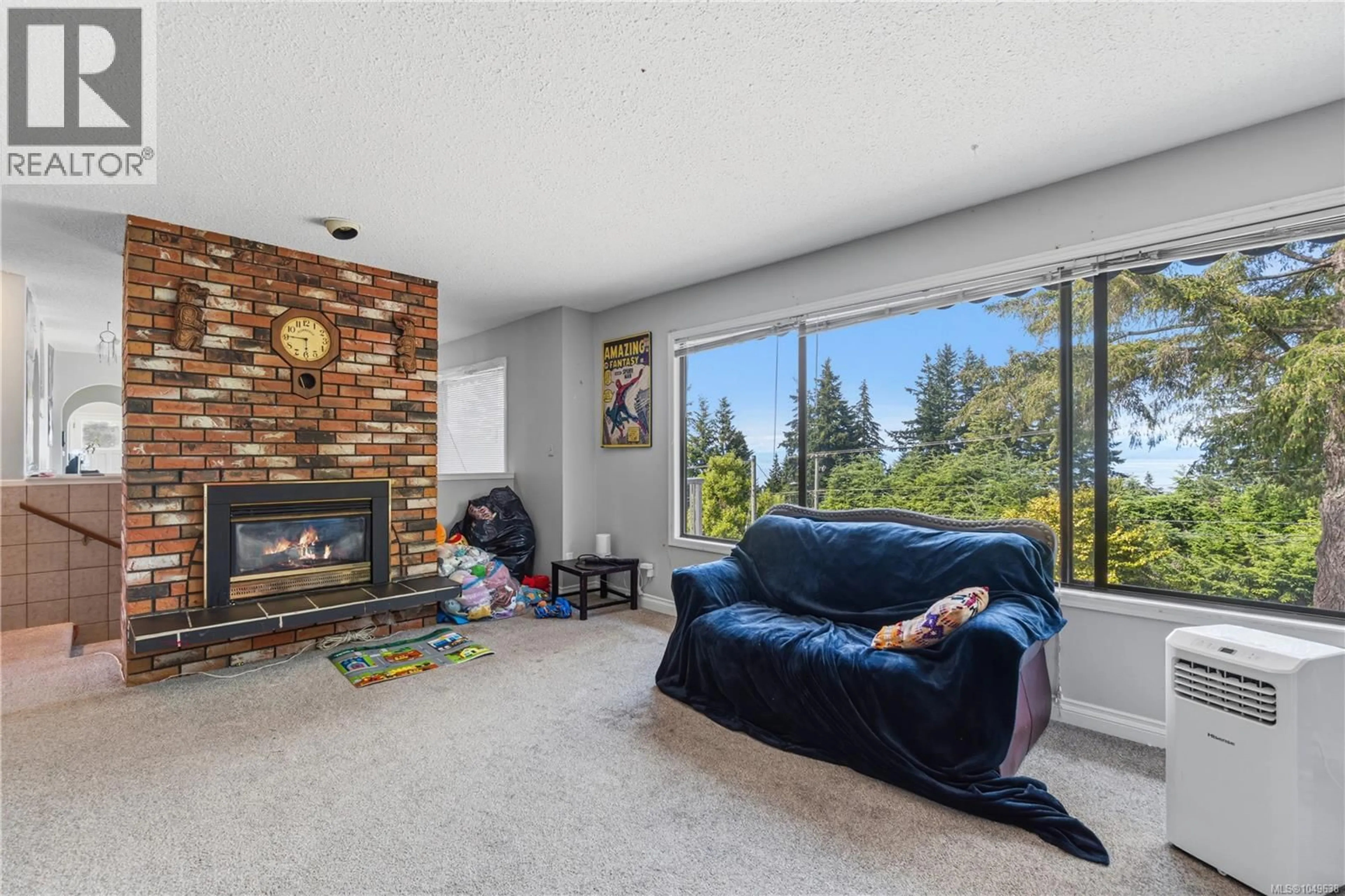 Living room with furniture, unknown for 5395 LOST LAKE ROAD, Nanaimo British Columbia V9T5E7