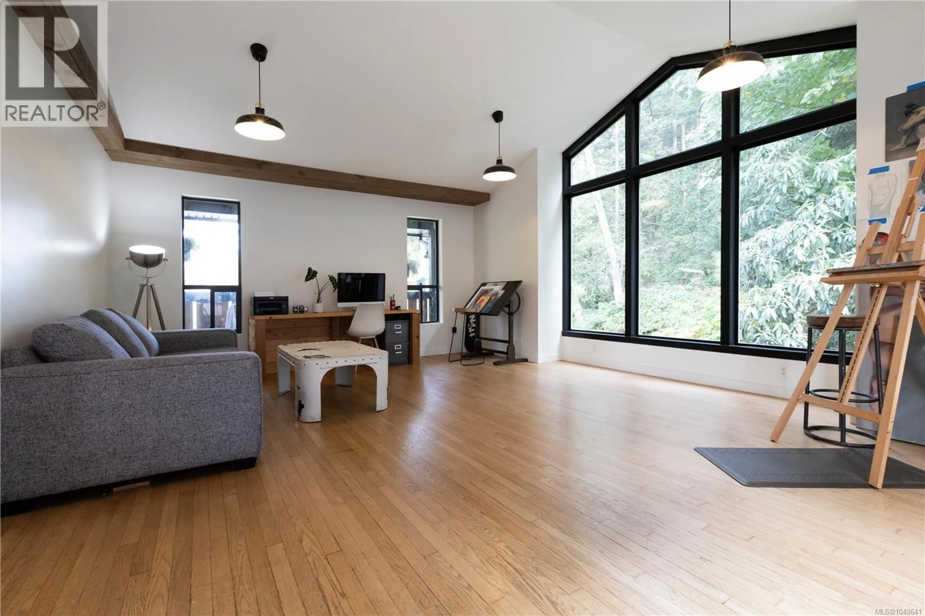 Living room with furniture, wood/laminate floor for 923 WALFRED ROAD, Langford British Columbia V9C2P3