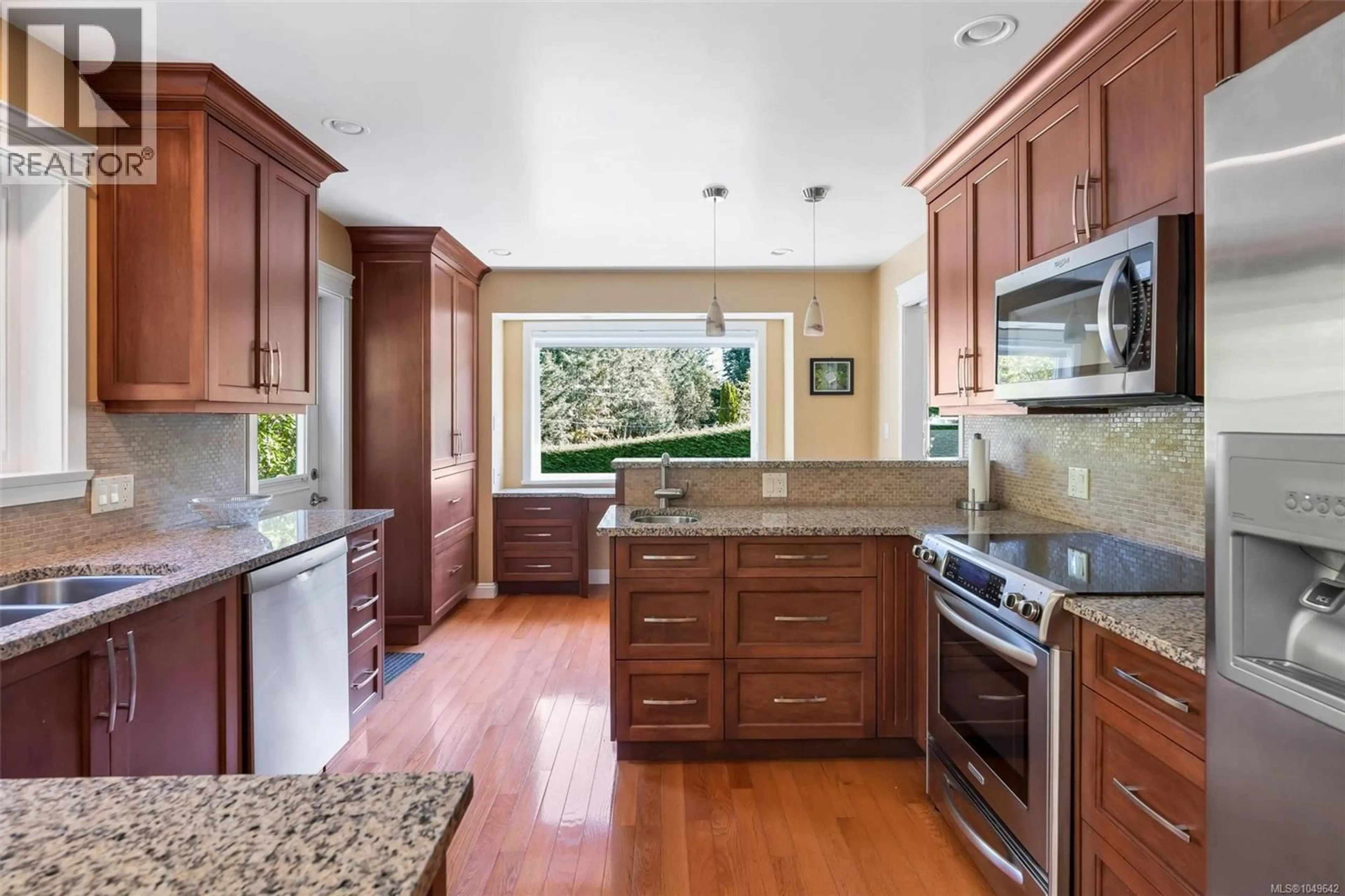 Open concept kitchen, ceramic/tile floor for 1453 HONEYSUCKLE PLACE, North Saanich British Columbia V8L5J8