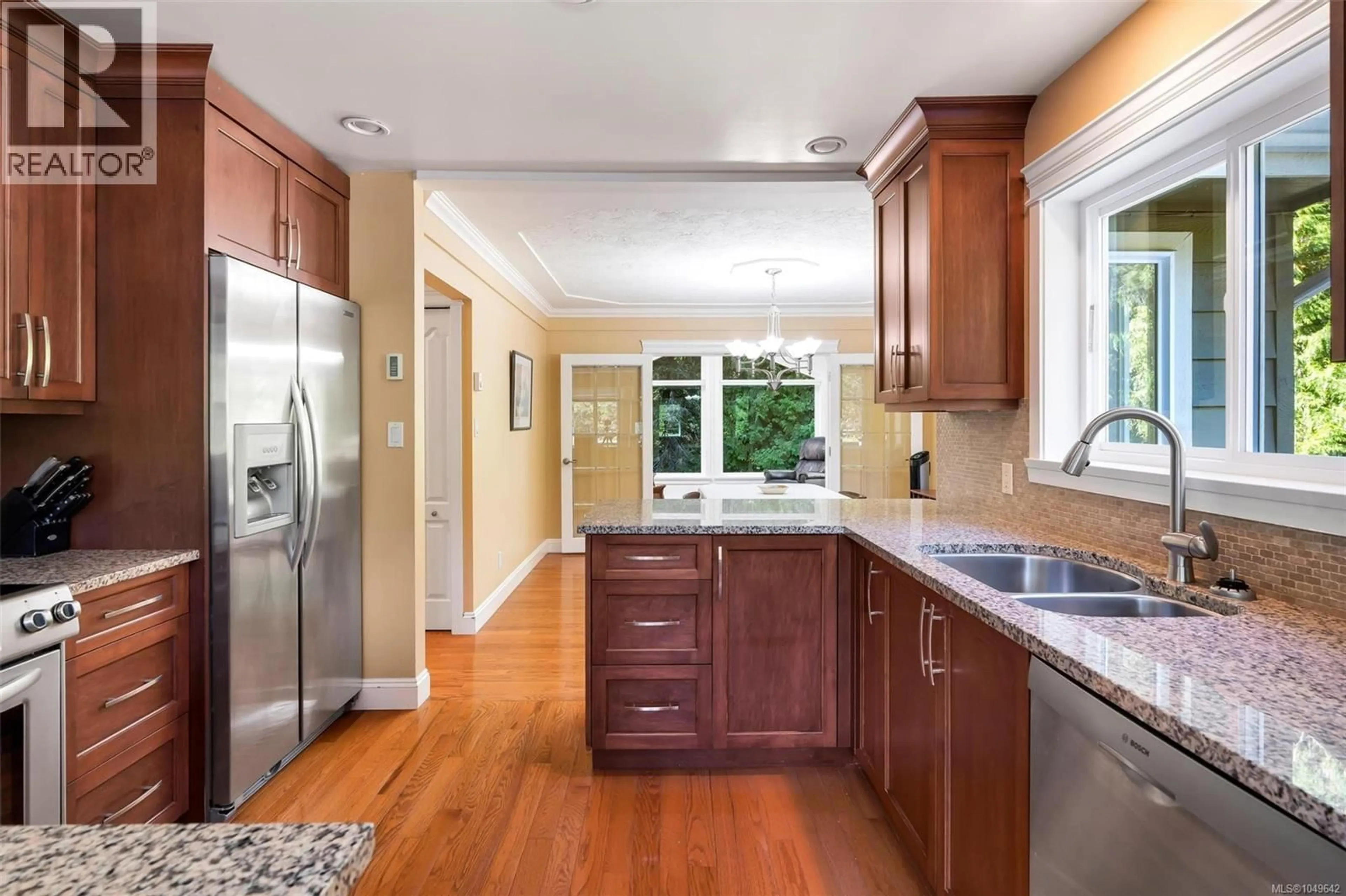 Open concept kitchen, ceramic/tile floor for 1453 HONEYSUCKLE PLACE, North Saanich British Columbia V8L5J8