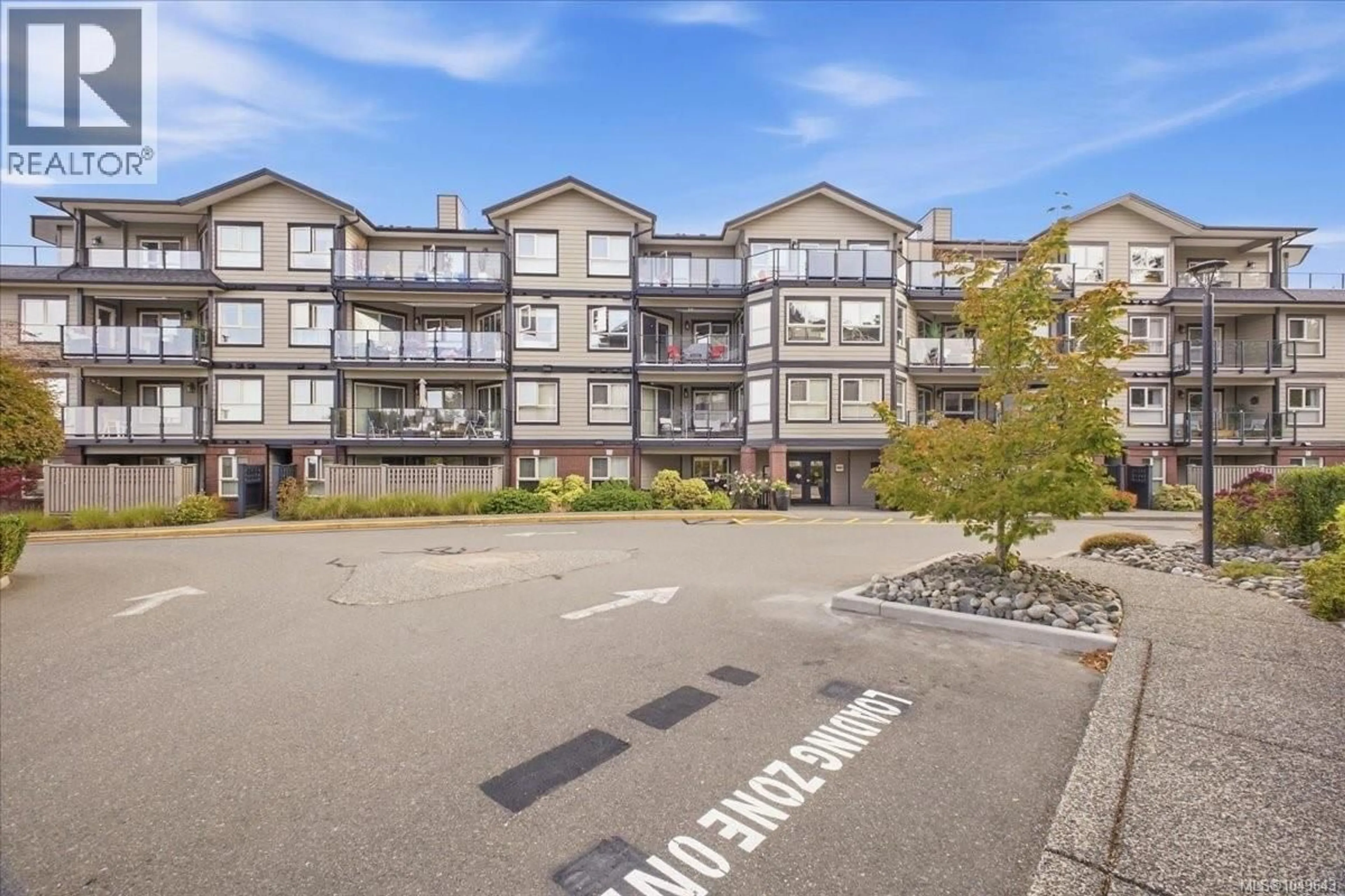 A pic from outside/outdoor area/front of a property/back of a property/a pic from drone, unknown for 301 - 6728 DICKINSON ROAD, Nanaimo British Columbia V9V1T3