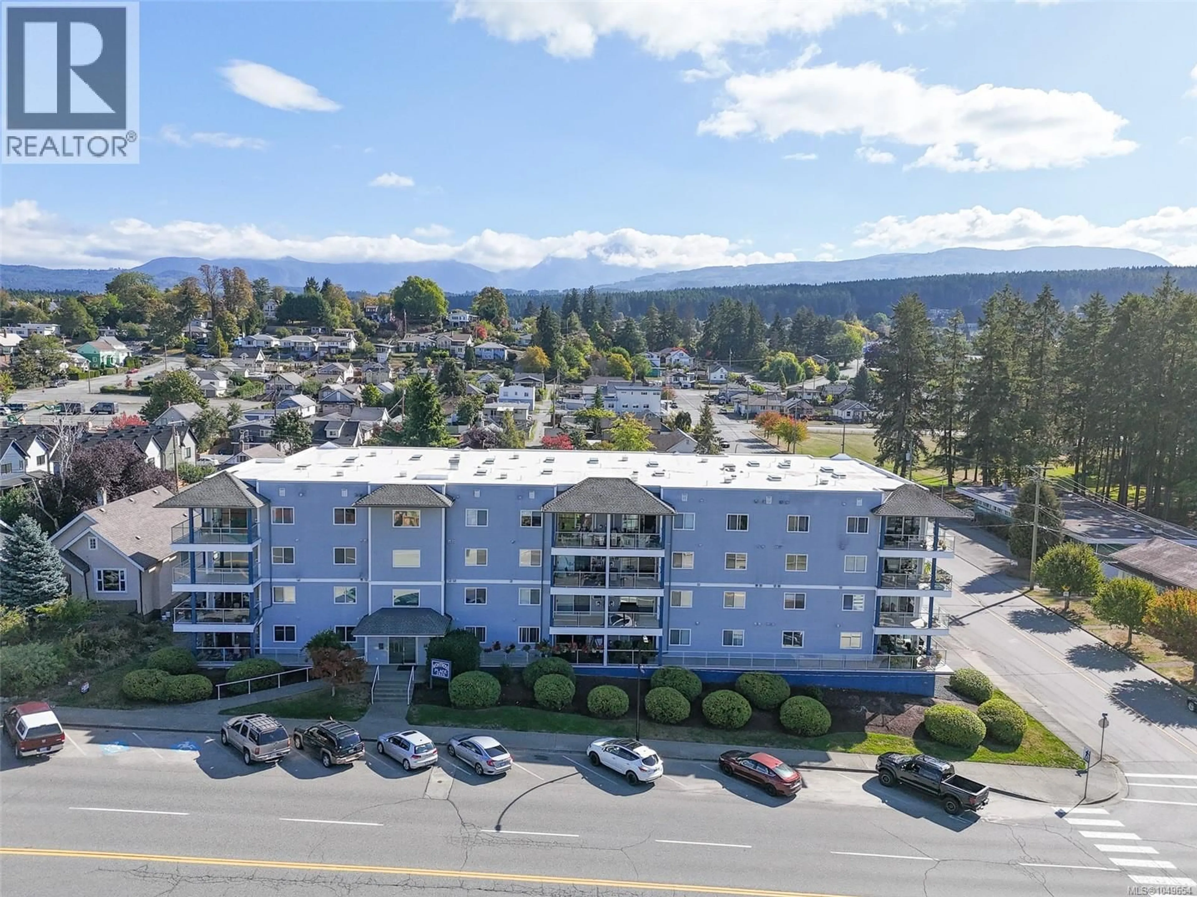 A pic from outside/outdoor area/front of a property/back of a property/a pic from drone, mountain view for 307 - 2825 3RD AVENUE, Port Alberni British Columbia V9Y2A9