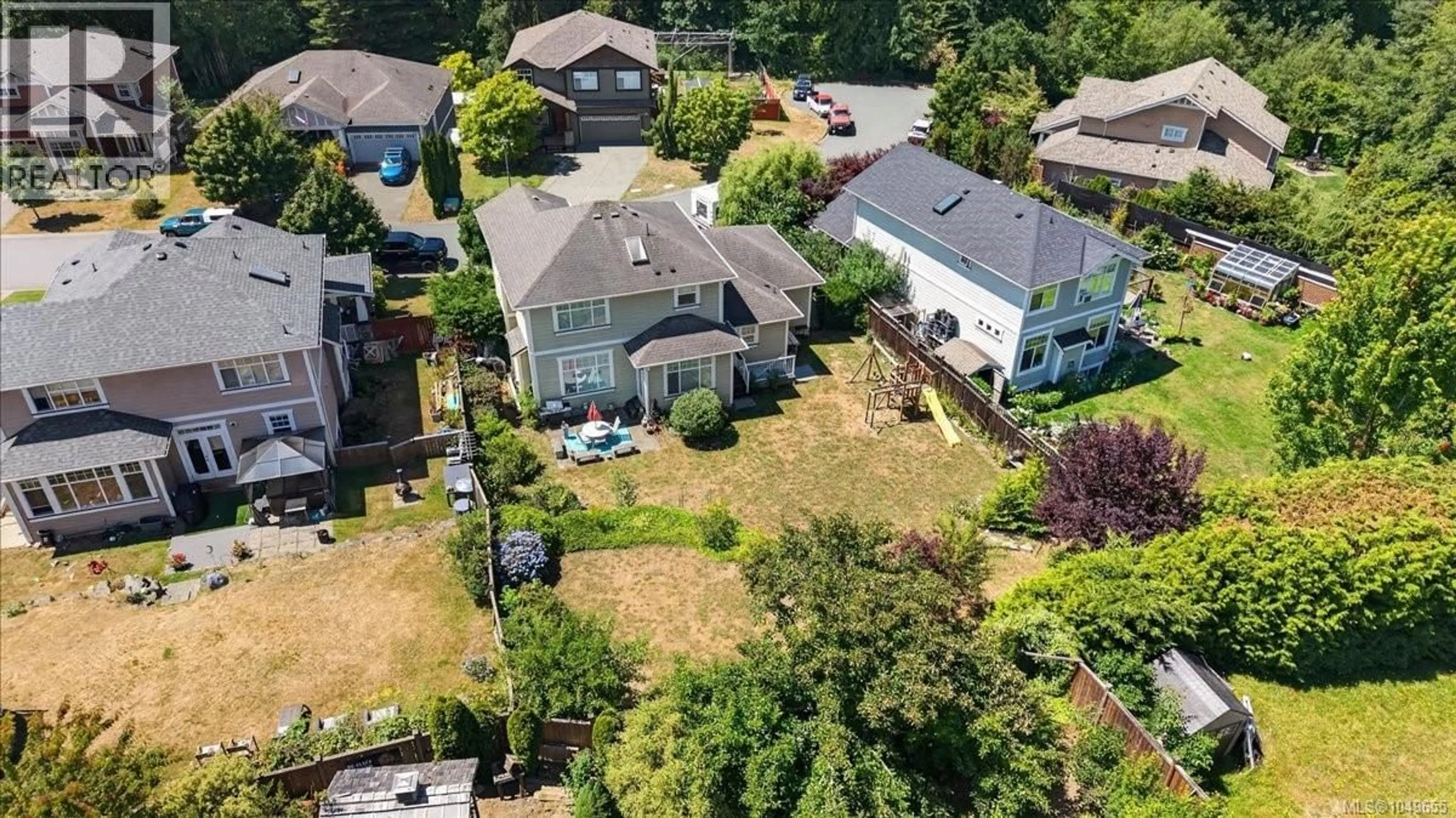 A pic from outside/outdoor area/front of a property/back of a property/a pic from drone, street for 6524 STONEWOOD DRIVE, Sooke British Columbia V9Z0Y6