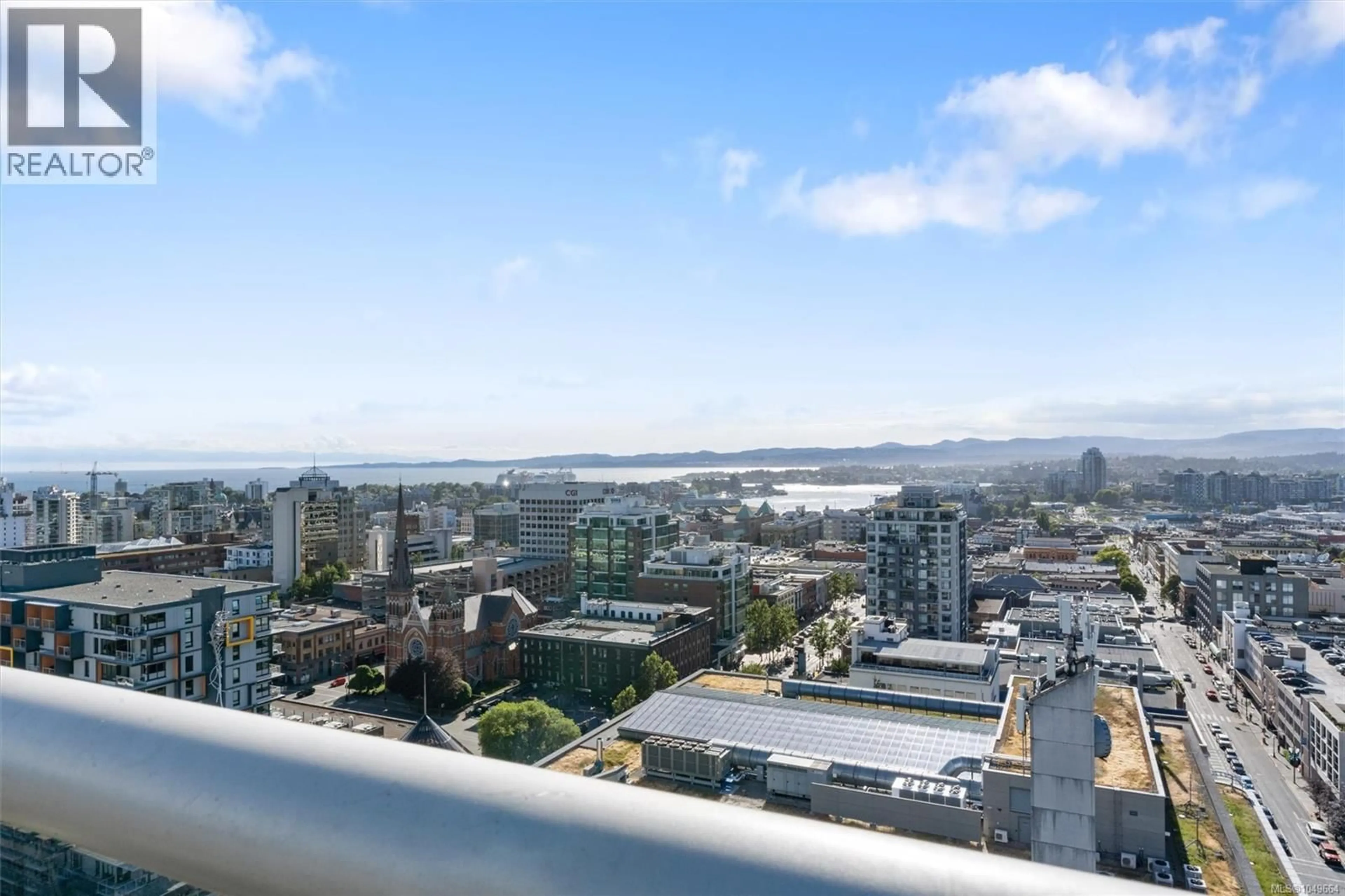 Balcony in the apartment, city buildings view from balcony for 604 - 845 JOHNSON STREET, Victoria British Columbia V8W0G3