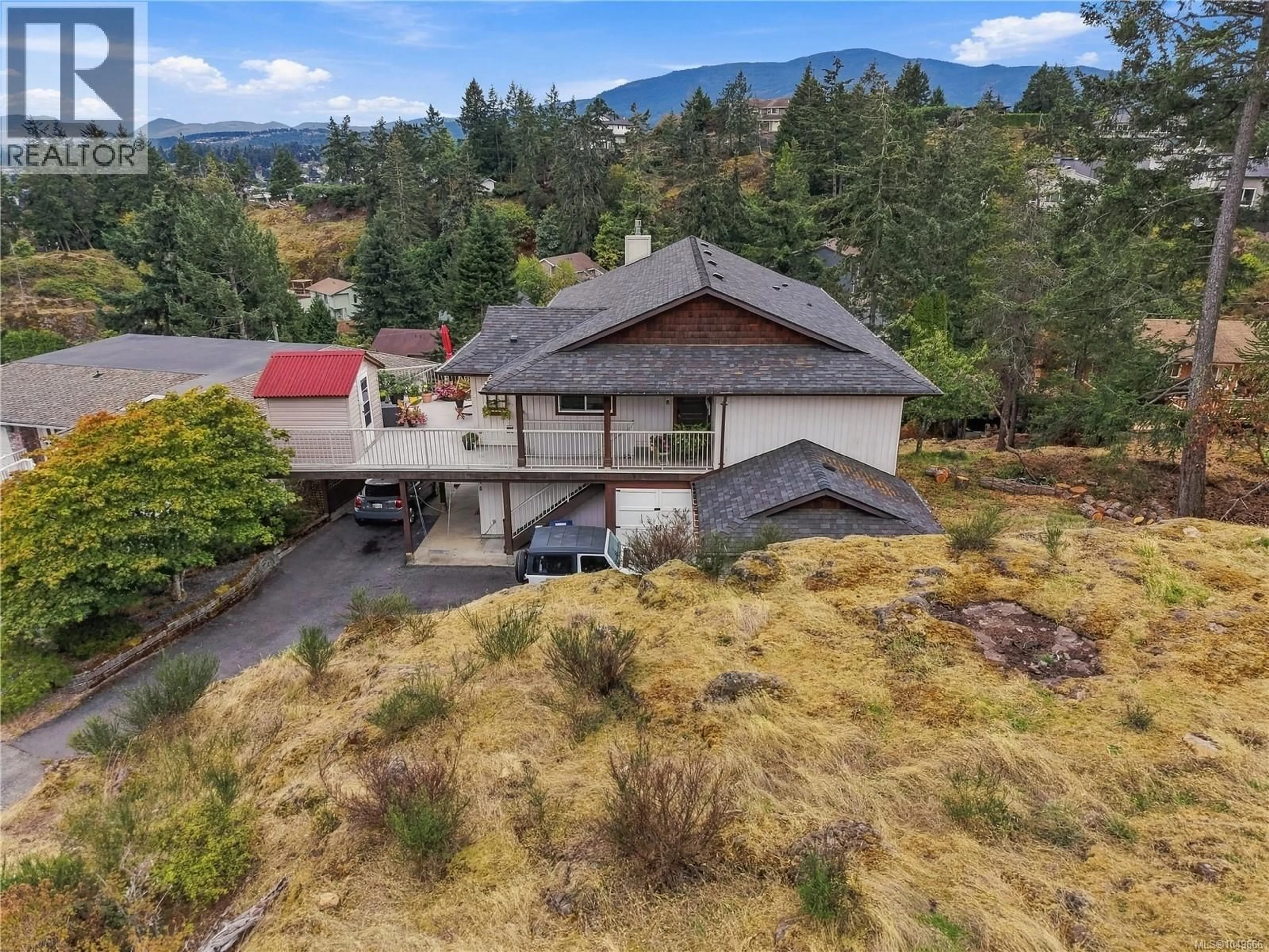 A pic from outside/outdoor area/front of a property/back of a property/a pic from drone, mountain view for 3146 ROBIN HOOD DRIVE, Nanaimo British Columbia V9T1P1