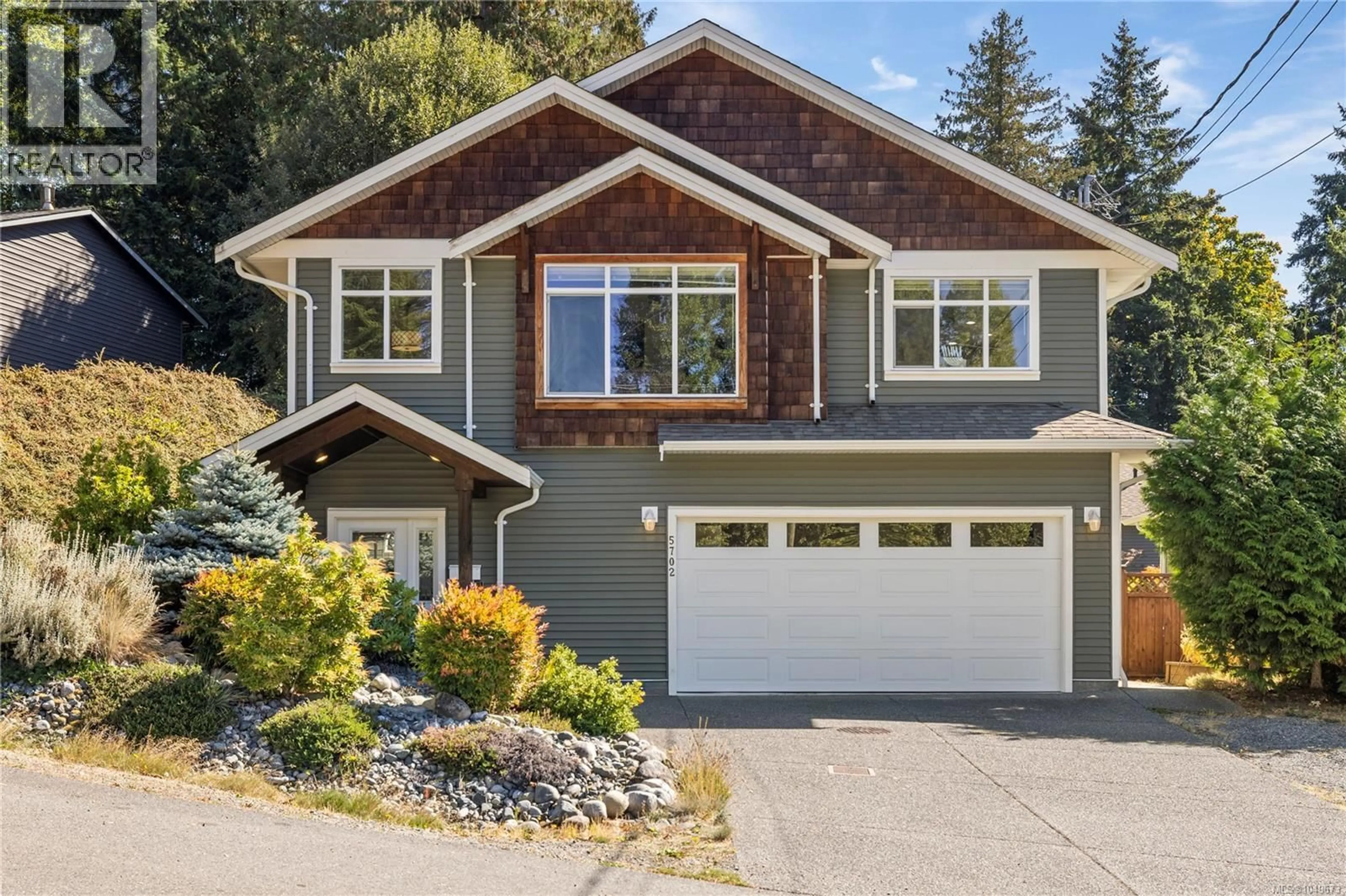 Home with vinyl exterior material, street for 5702 AMSTERDAM CRESCENT, Nanaimo British Columbia V9T5J4