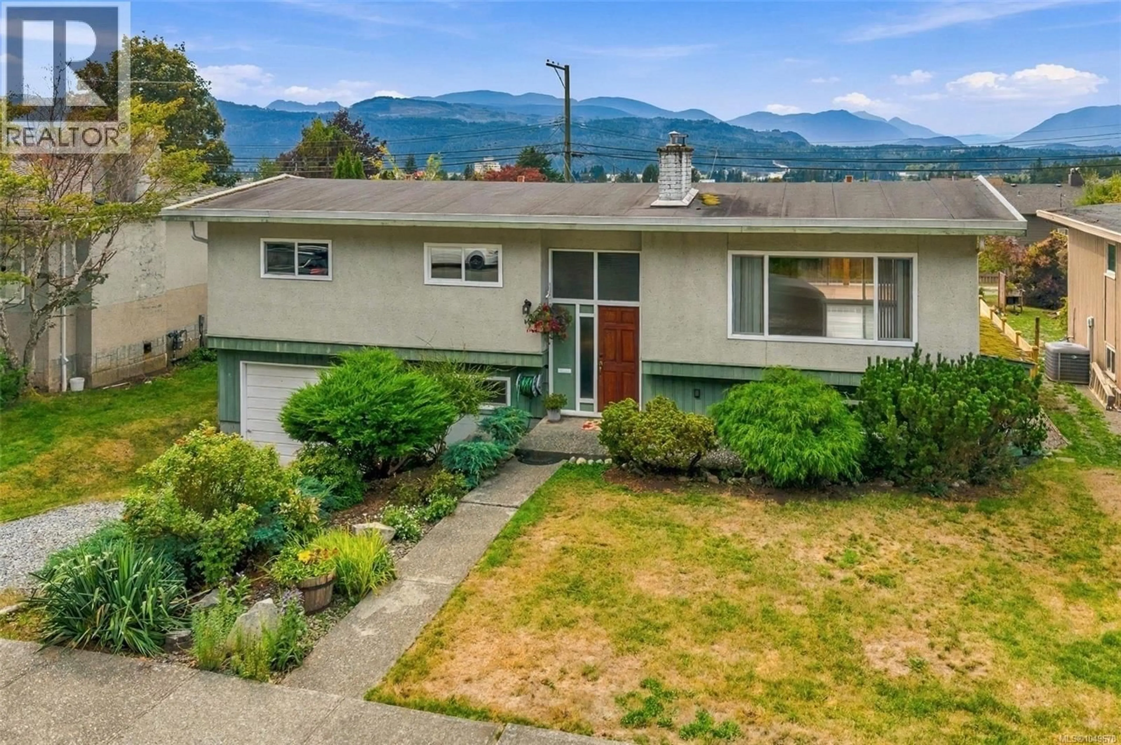 A pic from outside/outdoor area/front of a property/back of a property/a pic from drone, mountain view for 4066 21ST AVENUE, Port Alberni British Columbia V9Y5J6