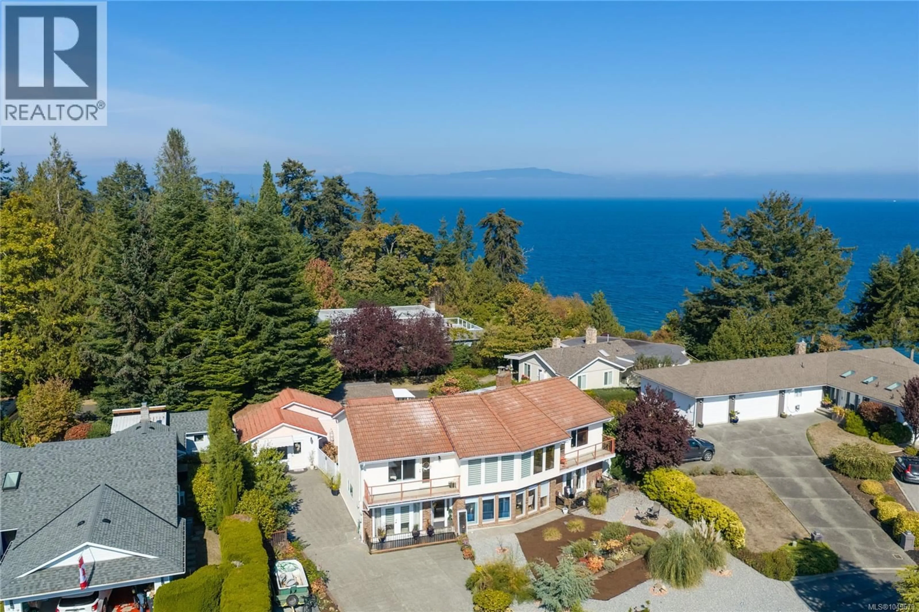 A pic from outside/outdoor area/front of a property/back of a property/a pic from drone, water/lake/river/ocean view for 511 PANORAMA PLACE, Parksville British Columbia V9P1A4