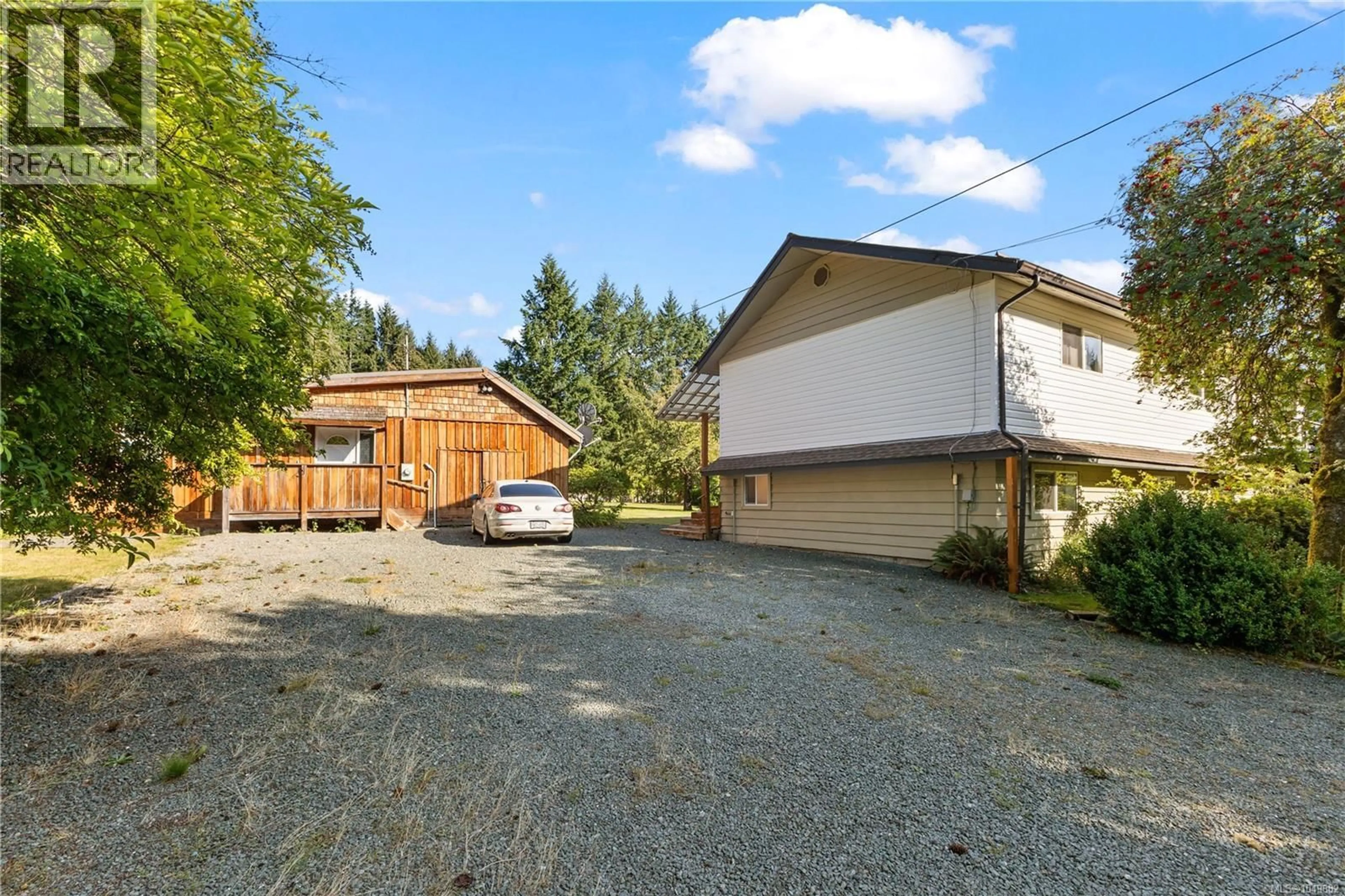 A pic from outside/outdoor area/front of a property/back of a property/a pic from drone, street for 1818 SACHTS ROAD, Sayward British Columbia V0P1R0