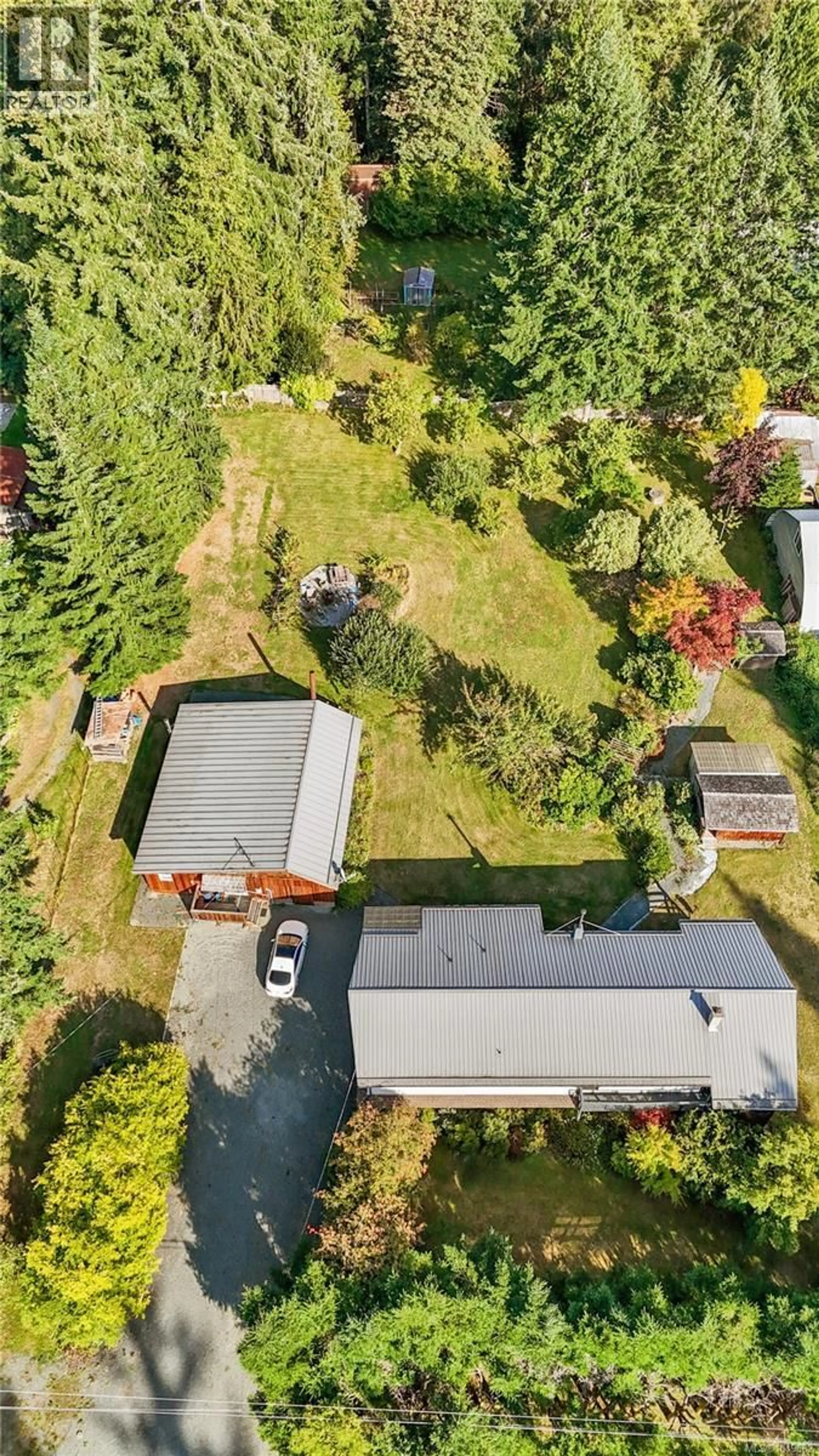 A pic from outside/outdoor area/front of a property/back of a property/a pic from drone, street for 1818 SACHTS ROAD, Sayward British Columbia V0P1R0