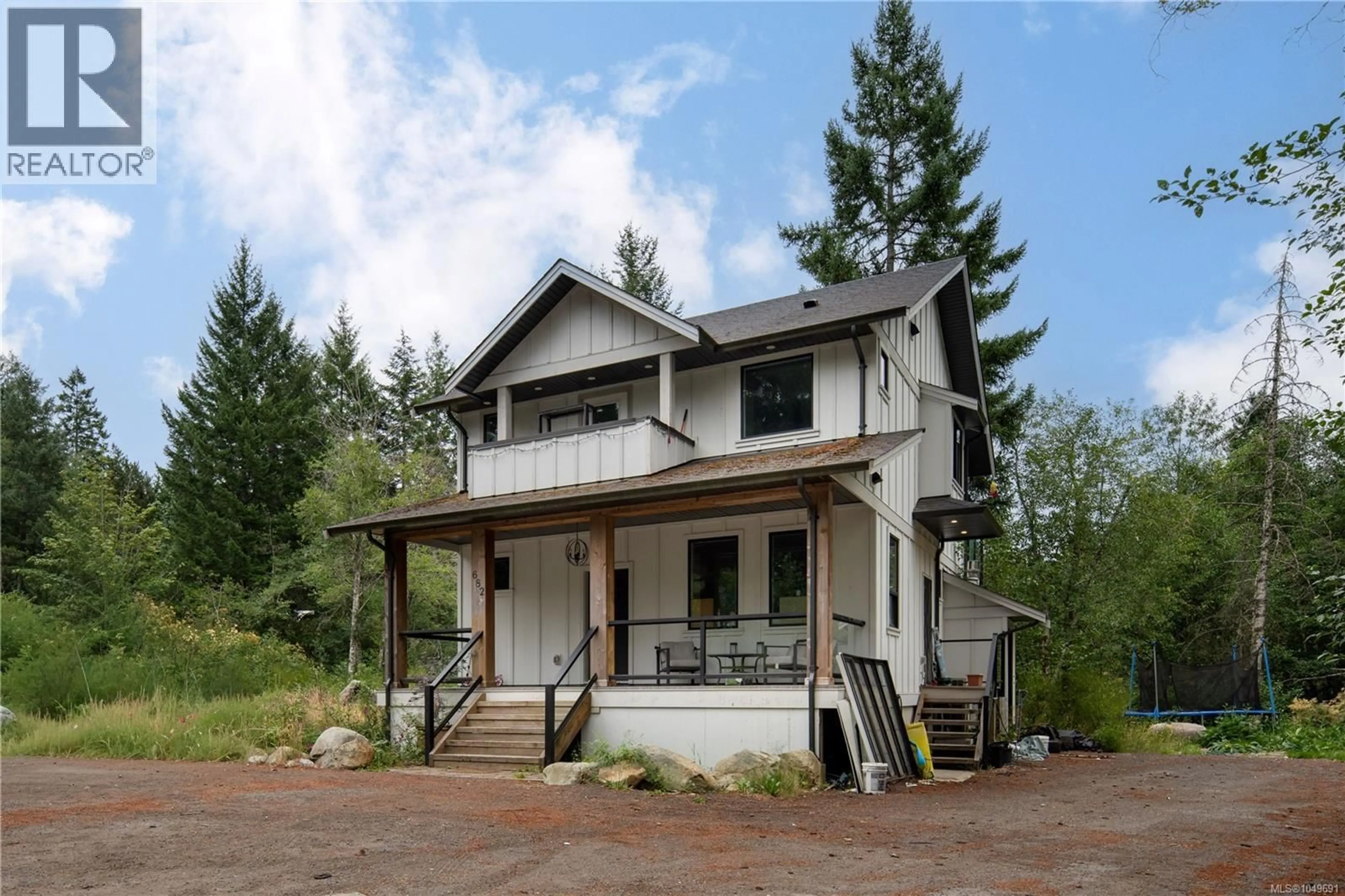 Home with vinyl exterior material, unknown for 682 SHAWNIGAN LAKE ROAD, Shawnigan Lake British Columbia V0R2L0