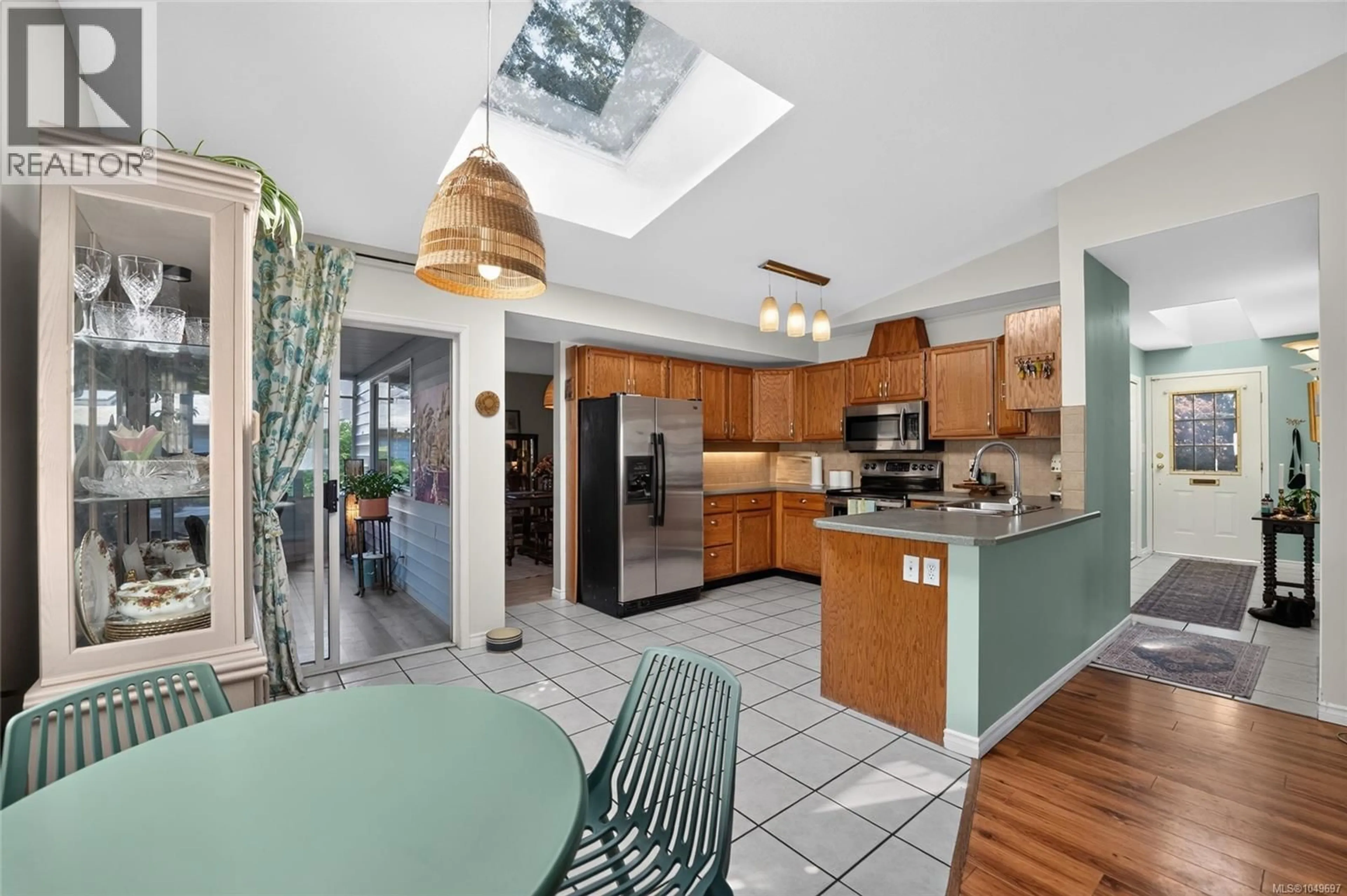 Open concept kitchen, ceramic/tile floor for 3560 FALCON DRIVE, Nanaimo British Columbia V9T4G8