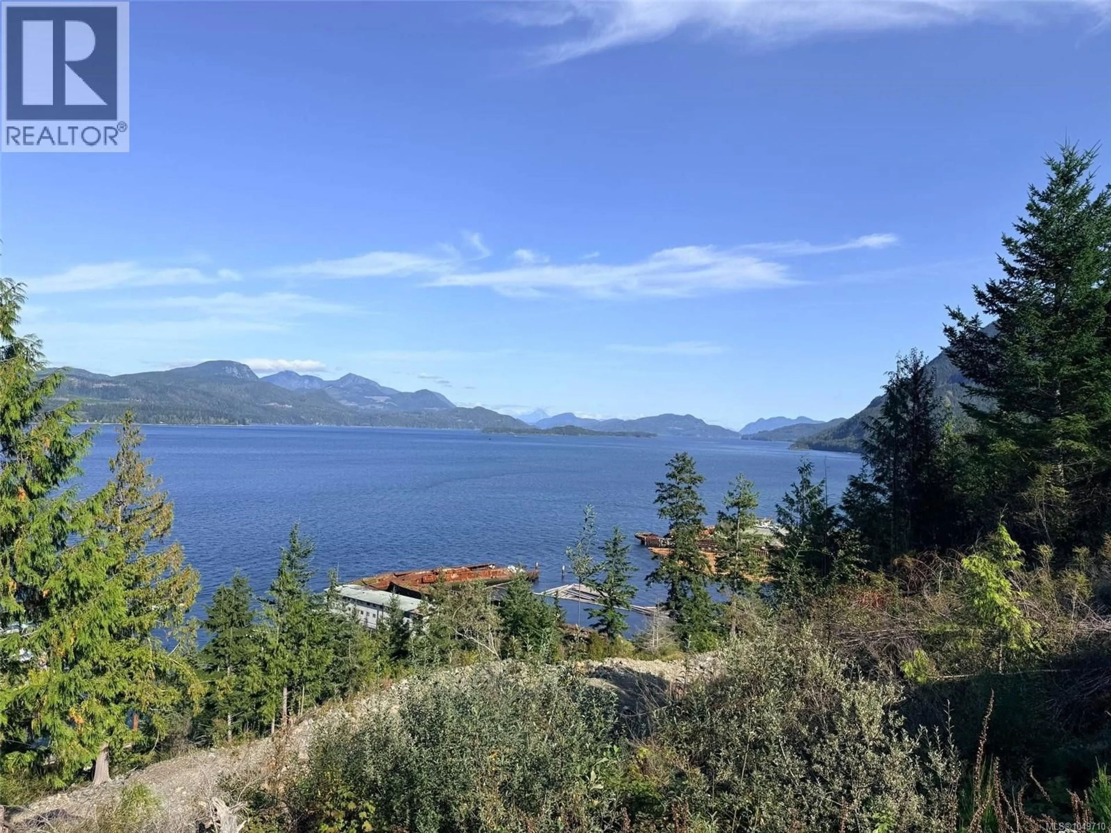 A pic from outside/outdoor area/front of a property/back of a property/a pic from drone, water/lake/river/ocean view for 18 SAYWARD ROAD, Sayward British Columbia V0P1R0