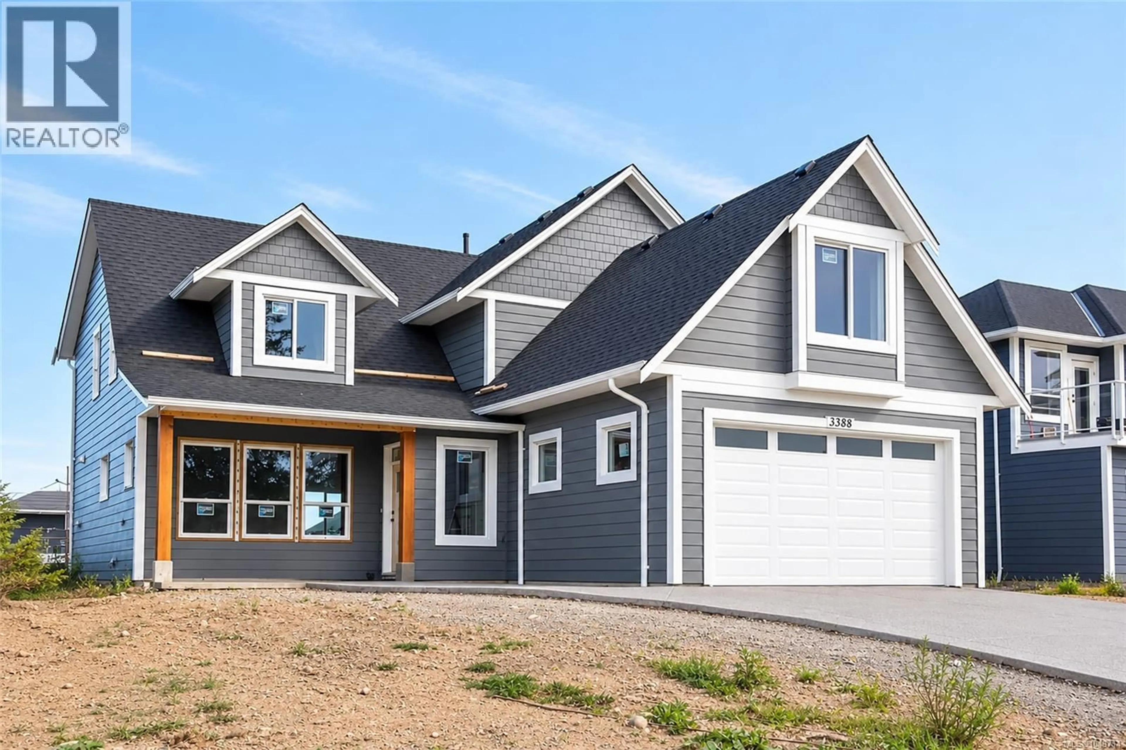 Home with vinyl exterior material, street for 3388 RHYS ROAD, Courtenay British Columbia V9N0B7