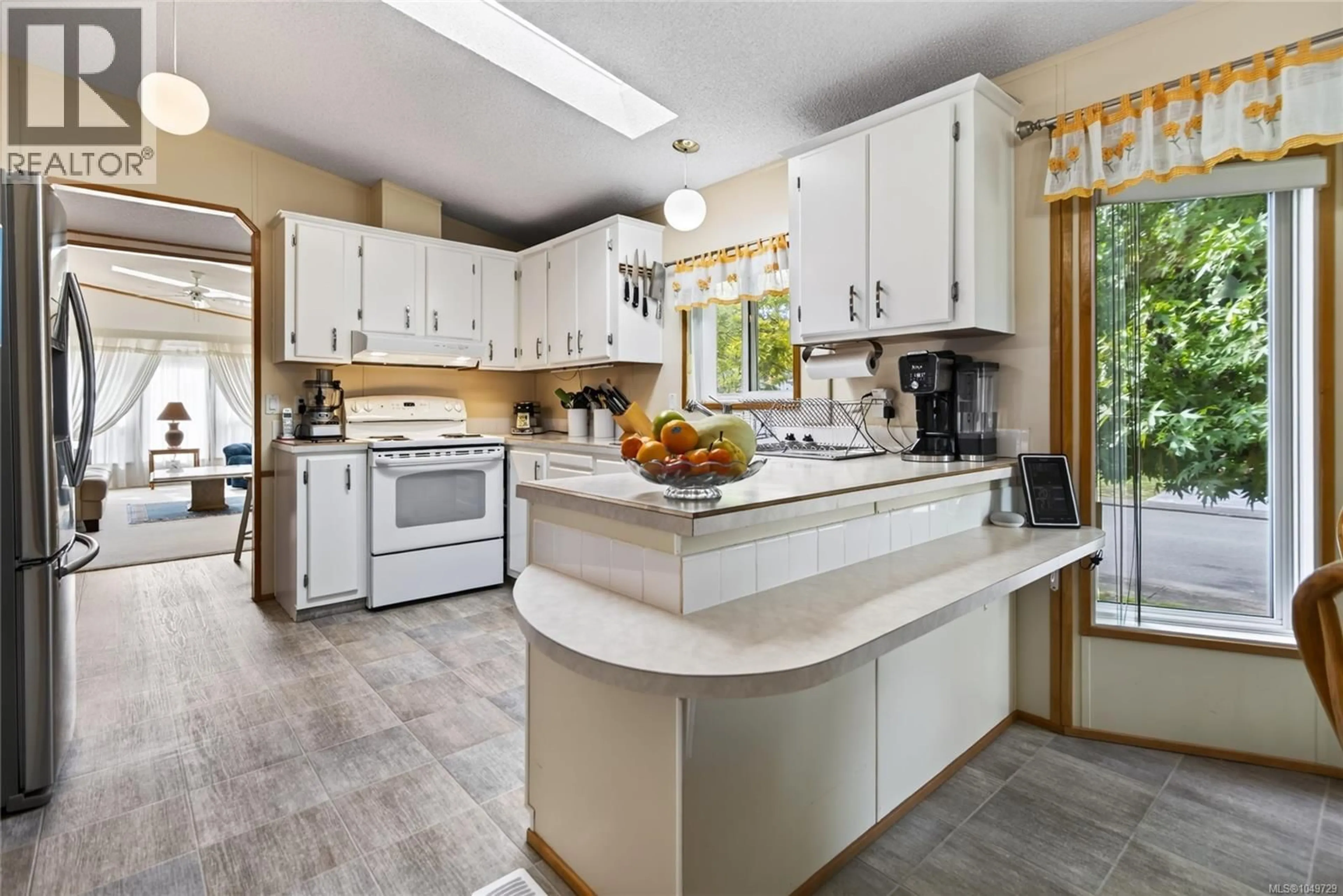 Open concept kitchen, ceramic/tile floor for 19 - 2140 20TH STREET, Courtenay British Columbia V9N2G6