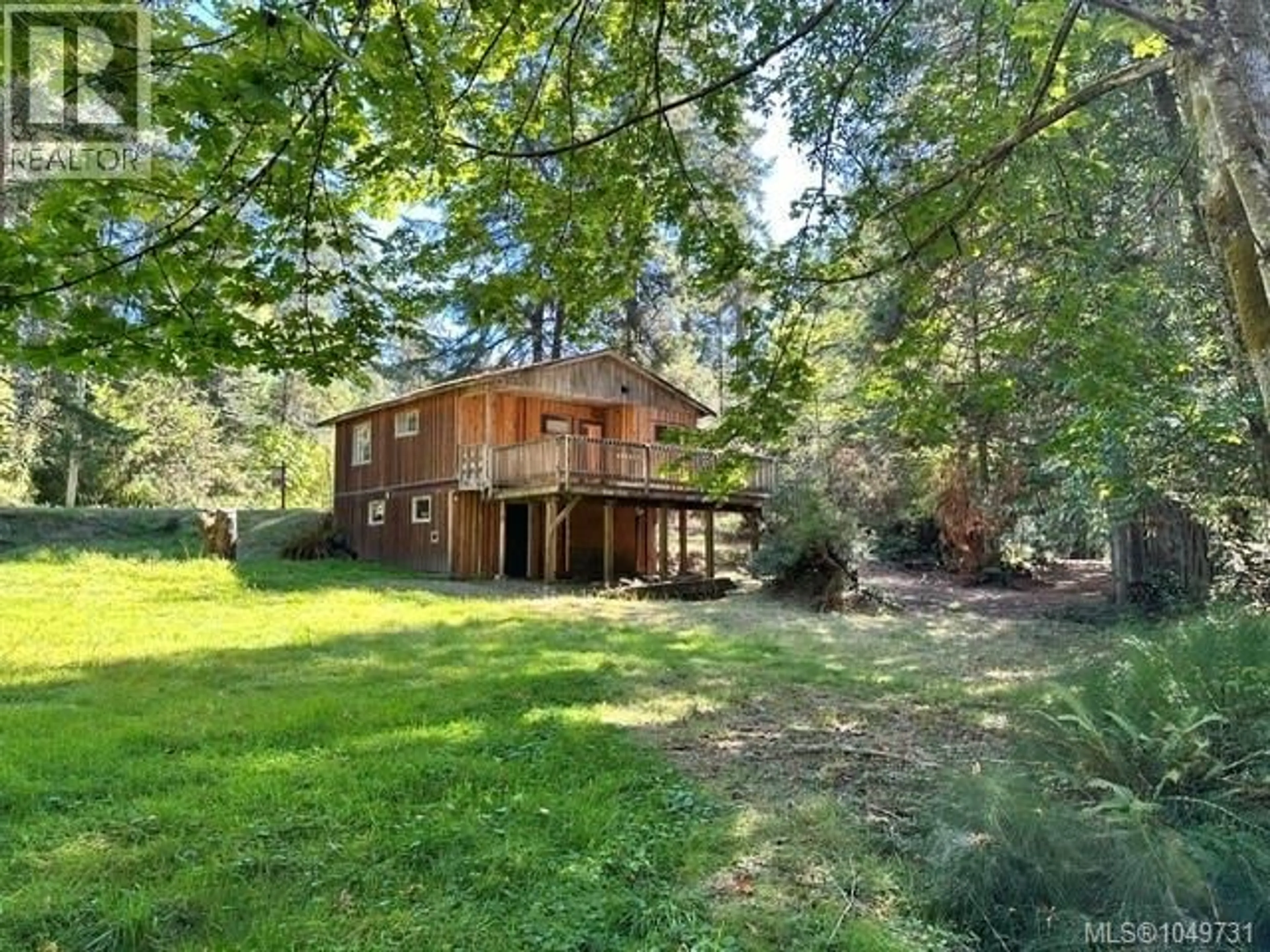 A pic from outside/outdoor area/front of a property/back of a property/a pic from drone, forest/trees view for 80 BLUE HERON ROAD, Thetis Island British Columbia V0R2Y0