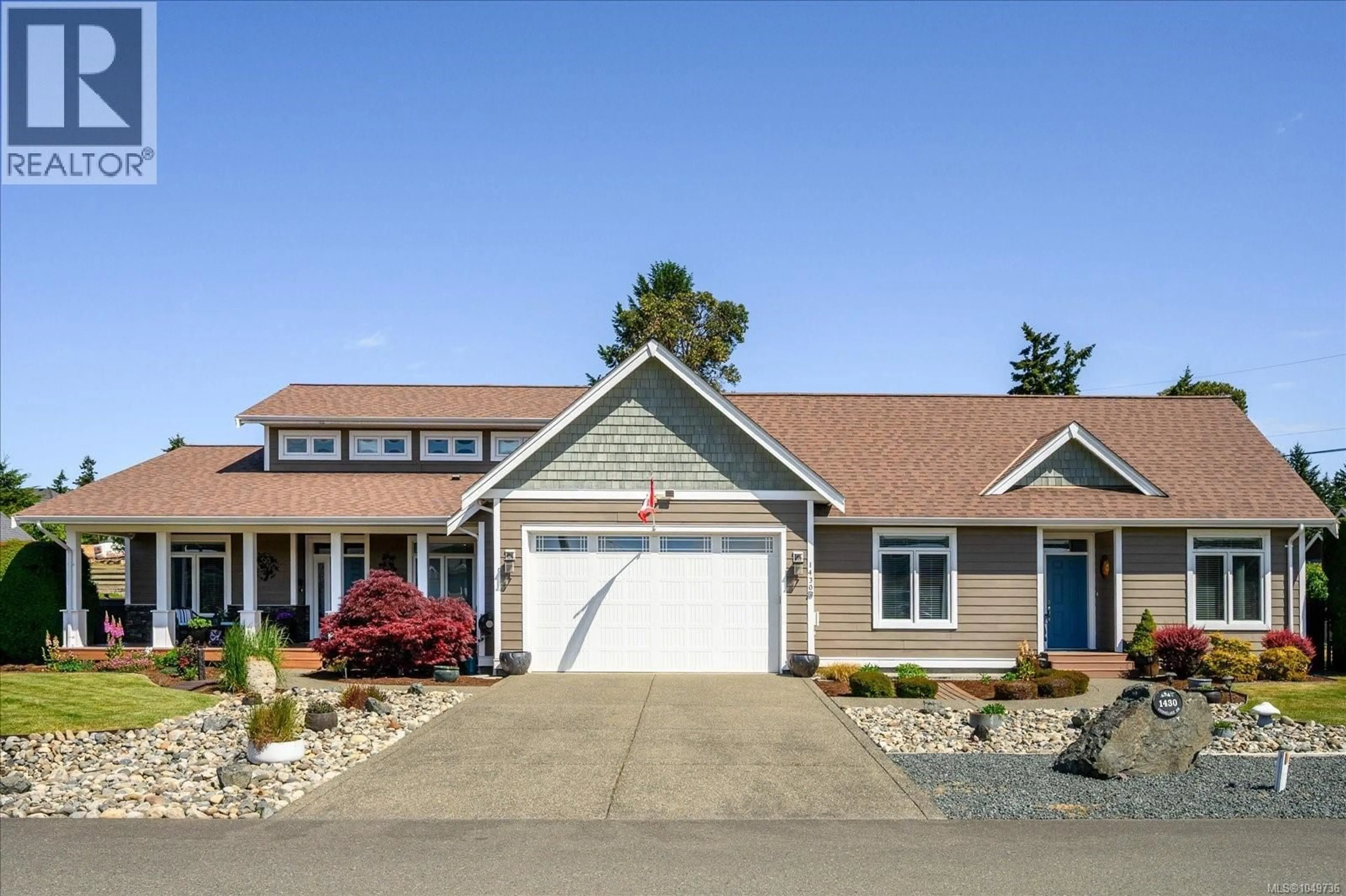 Home with vinyl exterior material, street for 1430 STONE LAKE DRIVE, Nanoose Bay British Columbia V9P9M4
