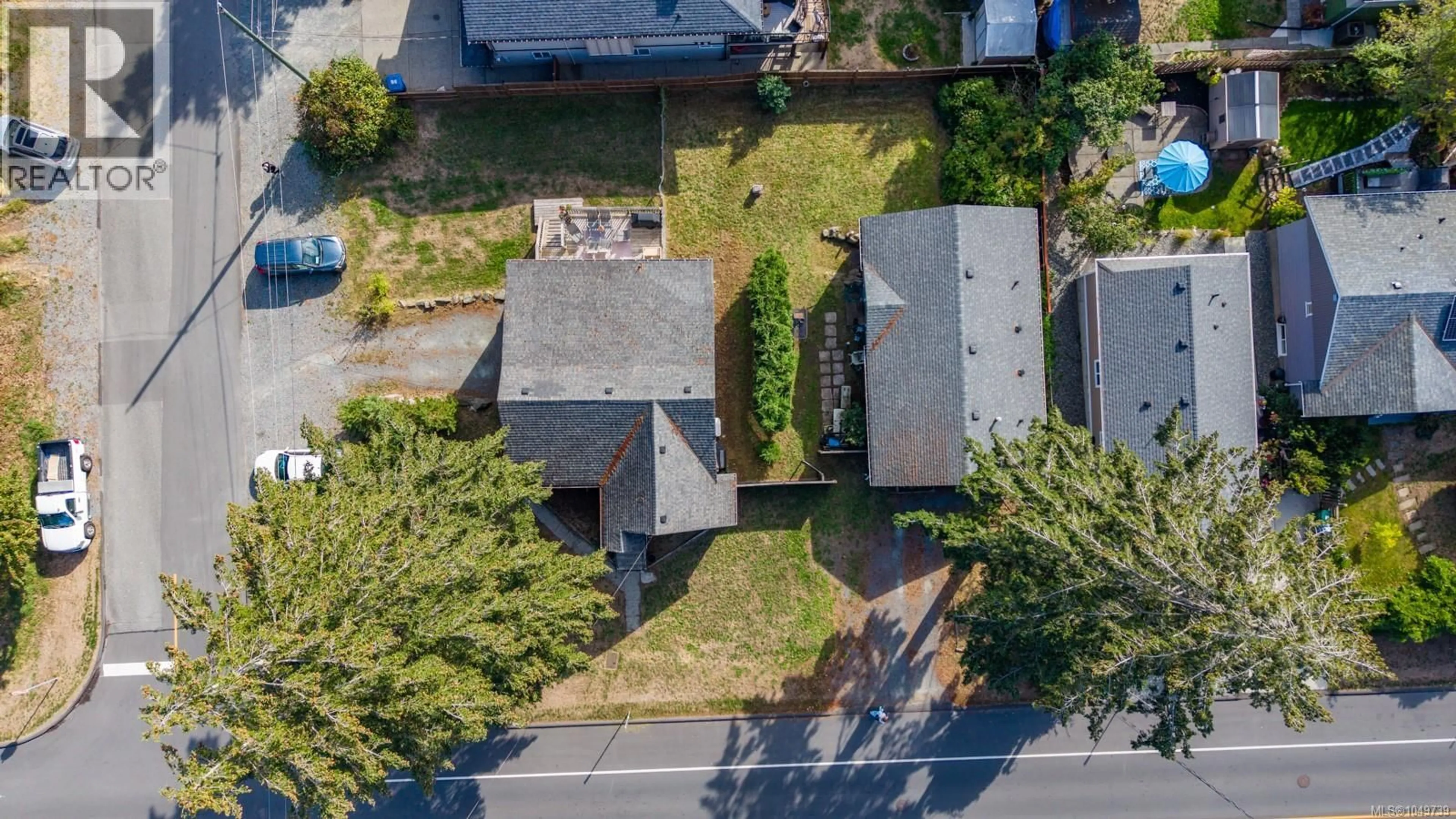 A pic from outside/outdoor area/front of a property/back of a property/a pic from drone, street for 980 MILLSTONE AVENUE, Nanaimo British Columbia V9S5B6