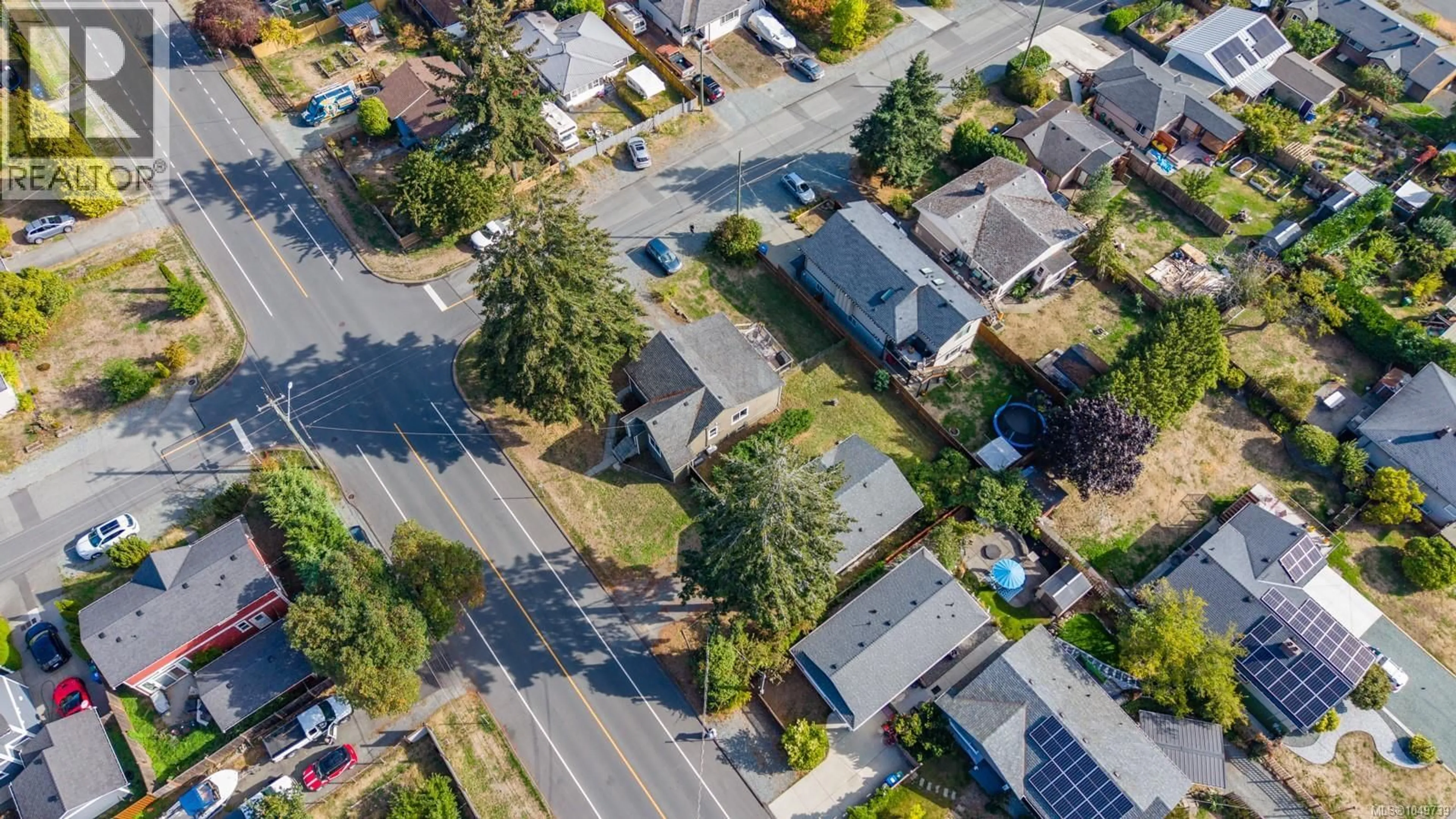A pic from outside/outdoor area/front of a property/back of a property/a pic from drone, street for 980 MILLSTONE AVENUE, Nanaimo British Columbia V9S5B6